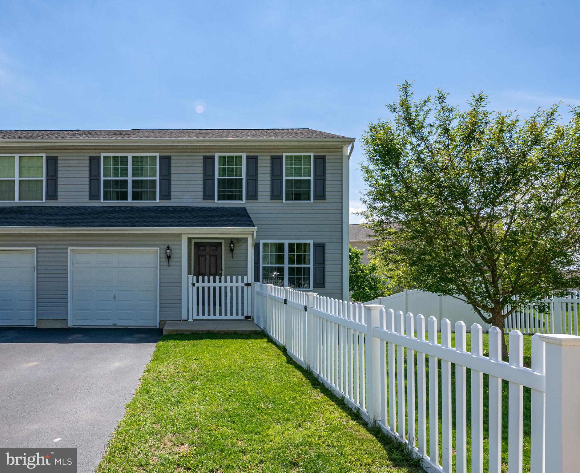 Welcome home to this charming semi-detached residence located in the sought-after Saylor Farm neighborhood.  This home has the perfect balance of comfort, function, and entertainment.  As you step inside, the inviting ambiance is highlighted with luxury-laminate flooring in the living room and dining area as well as an ample amount of natural light. All the carpeting in the home is brand new! The kitchen has oak cabinets, stainless-steel appliances, and tile flooring.  A half-bath and laundry room completes the first floor.  Upstairs you're greeted by three generously sized bedrooms and two full baths. You will greatly appreciate the cleanliness, the peaceful color pallet, and the feeling as though it's brand new.  As you make your way back downstairs, the lower level offers an opportunity to expand with ample space awaiting your personal touch, potentially adding even more livable square footage to this already impressive home.  The walk-out basement leads to a fenced backyard offering that boundary for the kids and pets to play.  It also gives you that added feeling of pride as it frames that little piece of land you call Home!  A convenient one-car garage completes this delightful home. Don't miss out on the chance to make this your new home sweet home—schedule your showing today before it's gone! One year Warranty included with acceptable offer.