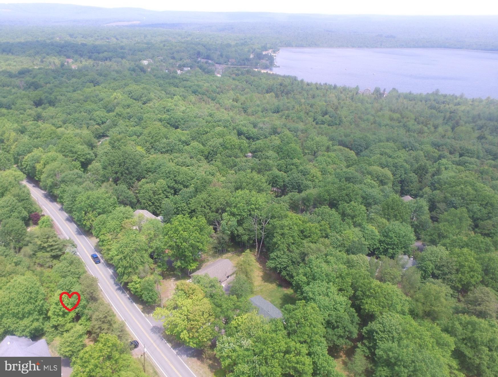 This Level building lot is offered for sale! The desirable community of Towamensing Trails has so much to offer! Whether you are looking to build a full-time home or a vacation destination, this area is the place to be! Short walk to the beach. Amenities include a beautiful sparkling clean lake with beach, outdoor pool, marina, tennis courts, and a restaurant inside the clubhouse. Call your builder or use one that we recommend!