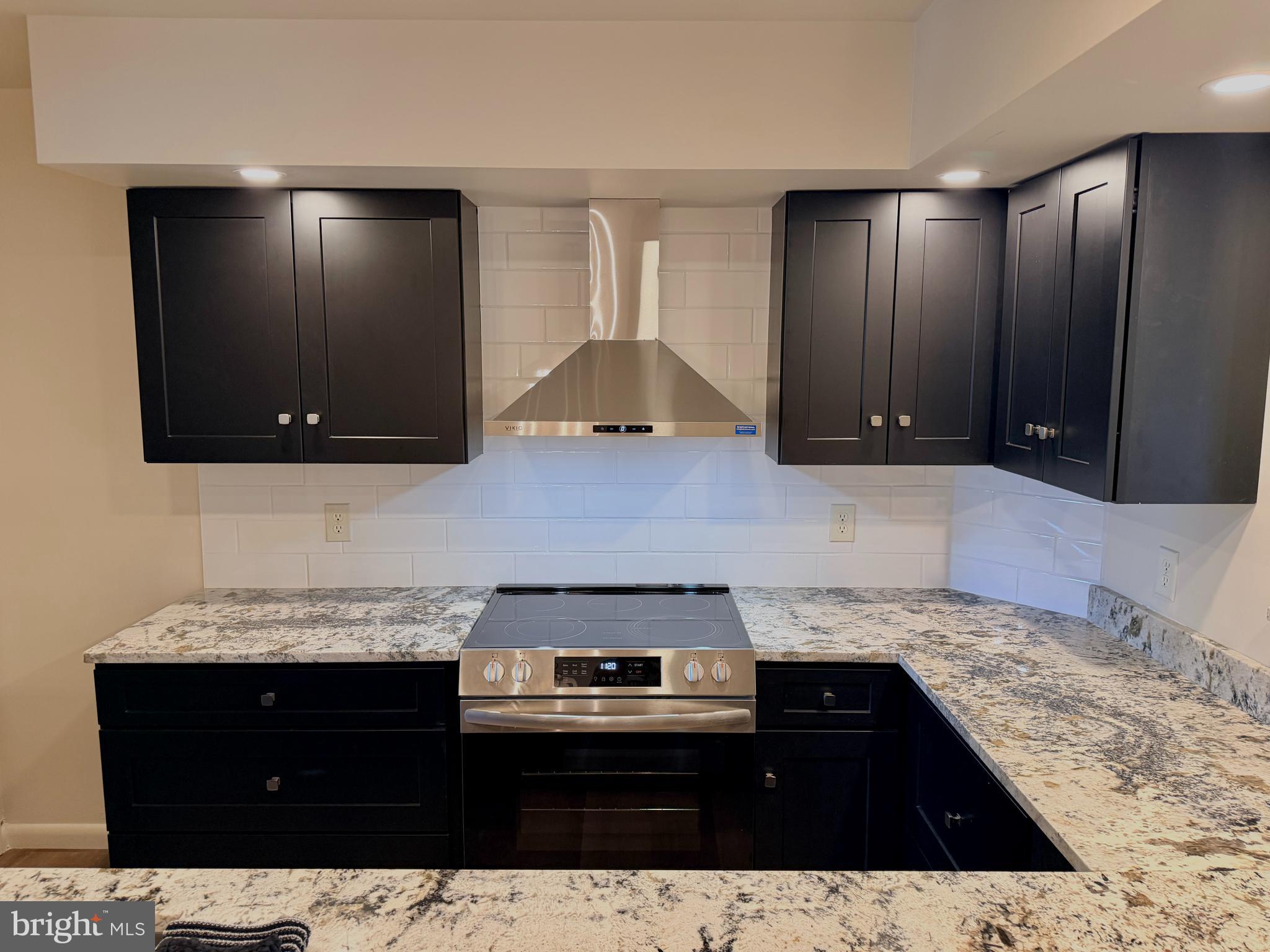 This freshly renovated Fleetwood townhome offers the perfect blend of modern finishes and functional living space. The stunning kitchen features upgraded cabinetry with granite countertops, a tile backsplash, and stainless steel appliances.

Throughout the home you'll find luxury vinyl plank flooring, upgraded lighting, fresh paint, and exceptional trim work that showcases the quality of the renovation. Major improvements include a new roof and numerous replacement windows, providing added peace of mind for years to come.

A rare bonus for this floor plan is the rear addition, which adds valuable extra living space and offers endless flexibility. Whether you envision a home office, breakfast area, den, playroom, hobby room, or additional workspace, this versatile area can easily adapt to your lifestyle.

Another standout feature is the finished lower level - complete with a wet bar, more living space, a half bath, and a utility room—this is an ideal setup for multigenerational living, extended family, guests, a recreation room, or a private home office.

Parking is convenient with one off-street space in the rear alley plus two additional designated parking spaces directly across the street.

Schedule your private tour today—this beautifully updated home won't last long!