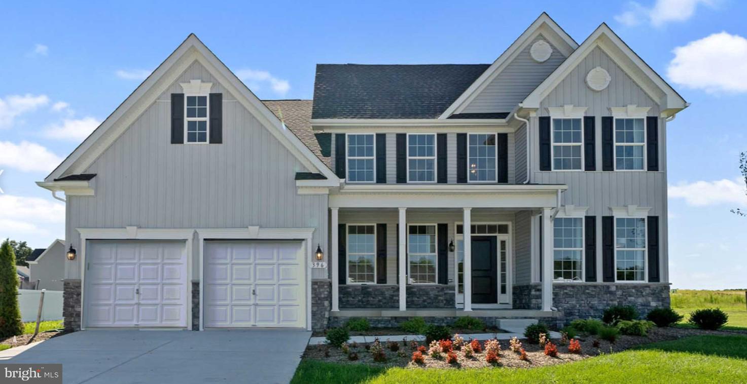 This to-be-built Sycamore Floorplan is a classic style and comfort define this four bedroom, 2.5 bath colonial — a perfect fit for multi-generational living with the option for dual owner’s suites. The main level features a spacious owner’s suite with bathroom and walk-in closet, a two-story family room, formal living and dining rooms, and a large kitchen with optional sunroom. Upstairs, choose between the included three-bedroom layout or the optional secondary primary suite and additional bathroom options. Finish the lower level with a rec room, media space, third bath, and storage.  This home is wonderful for growing families or merging families.  You can customize this home by choosing to add French doors to the living room for a home office or private retreat, adding additional space in the owner’s suite and sunroom.  .  Kitchen appliances include Samsung stainless steel refrigerator, 42” kitchen cabinets, granite countertops, double wall-oven, dishwasher, microwave, and a large walk-in pantry.  Other features included: 2-car front-entry garage, stone water table, unfinished basement with 9 ft ceilings and rough-in for future bathroom. Located in the Caesar Rodney School District. Sidewalks and streetlights, public water, public sewer, and natural gas.  Close to shopping, restaurants, and easy access to highways. Pictures are of similar home; different front elevations are available.  Price shown is the base price. Call about our Military appreciation incentive (Active/Retired Military only). 
On-site, unlicensed salespeople represent the seller only.