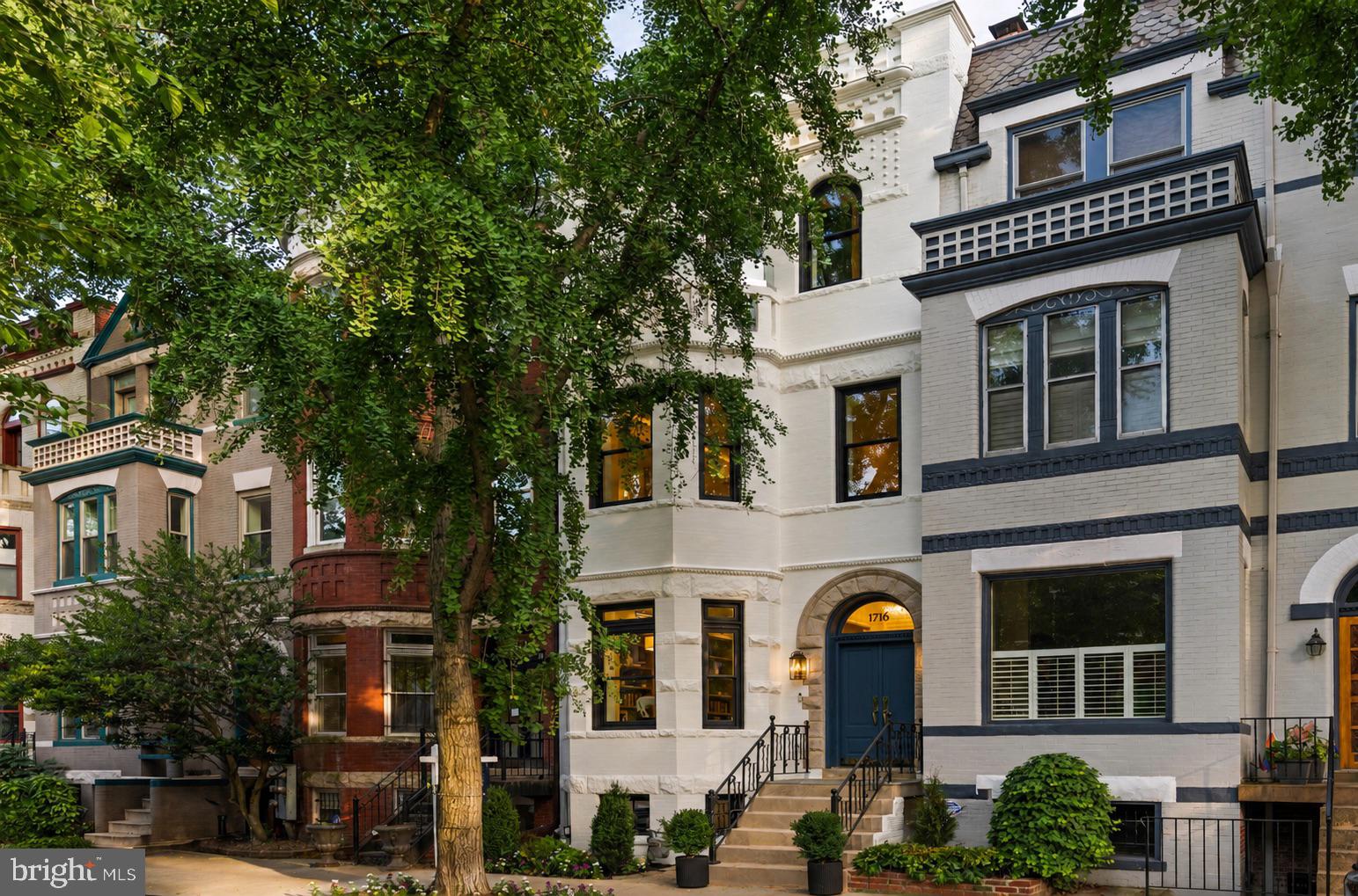 Set beneath the iconic canopy of Swann Street's celebrated ginkgo trees, one of Washington's most coveted and picturesque residential blocks, 1716 Swann Street NW represents an exceptional collaboration between premier builder District495 and Cunningham | Quill Architects seamlessly blending timeless architecture with modern engineering, refined design, and uncompromising craftsmanship.

Spanning more than 3,800 square feet across four beautifully finished levels, the home offers five bedrooms and five-and-one-half baths with expansive, light-filled living spaces designed for both elegant entertaining and everyday comfort. A professional kitchen showcases custom two-tone cabinetry, marble surfaces, and a luxury appliance suite by Thermador and ILVE, while fixtures by Waterworks, lighting from Visual Comfort, Rejuvenation, and Hudson Valley, custom millwork, integrated smart home technology, and a whole-home audiovisual system reflect an extraordinary level of finish throughout.

Beyond its beauty, the home was engineered for exceptional livability. Separate HVAC systems serve each floor independently, providing individualized climate control, improved efficiency, and year-round comfort rarely found in homes of this size. Additional highlights include elevator-ready construction, a connected lower-level apartment with its own Certificate of Occupancy, a rooftop terrace, front balcony overlooking Swann Street's famous ginkgo canopy, and a secure two-car parking pad with EV charging.

Located on one of Dupont Circle's most admired one-way streets, just moments from the neighborhood's restaurants, cafés, Metro, parks, and the energy of Logan Circle, 1716 Swann Street is a home where exceptional design, thoughtful construction, and an irreplaceable location come together in one extraordinary offering.
