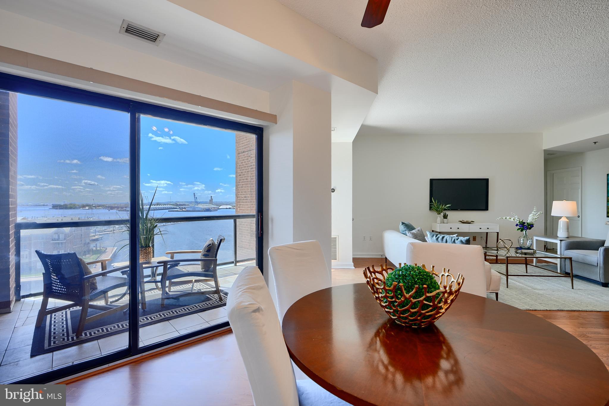 Waterfront living at its best in Canton's upscale Anchorage Towers!  Enjoy the calm of coffee on your balcony overlooking the beautiful  waterfront or unwind after a busy day while the evening lights sparkle! Open, spacious & updated, this one bedroom offers a large footprint including a granite and stainless steel kitchen, roomy dining room and living room, large private bedroom suite with access to laundry, bath and offering generous closet space. Two sliding doors offer a light filled view of the water from both the dining and living rooms and flow directly onto the inviting balcony.  Anchorage tower is a luxury pet friendly building with exercise room, community gathering space, 24 hour front desk support and 24 hour security. An amazing place to live!
