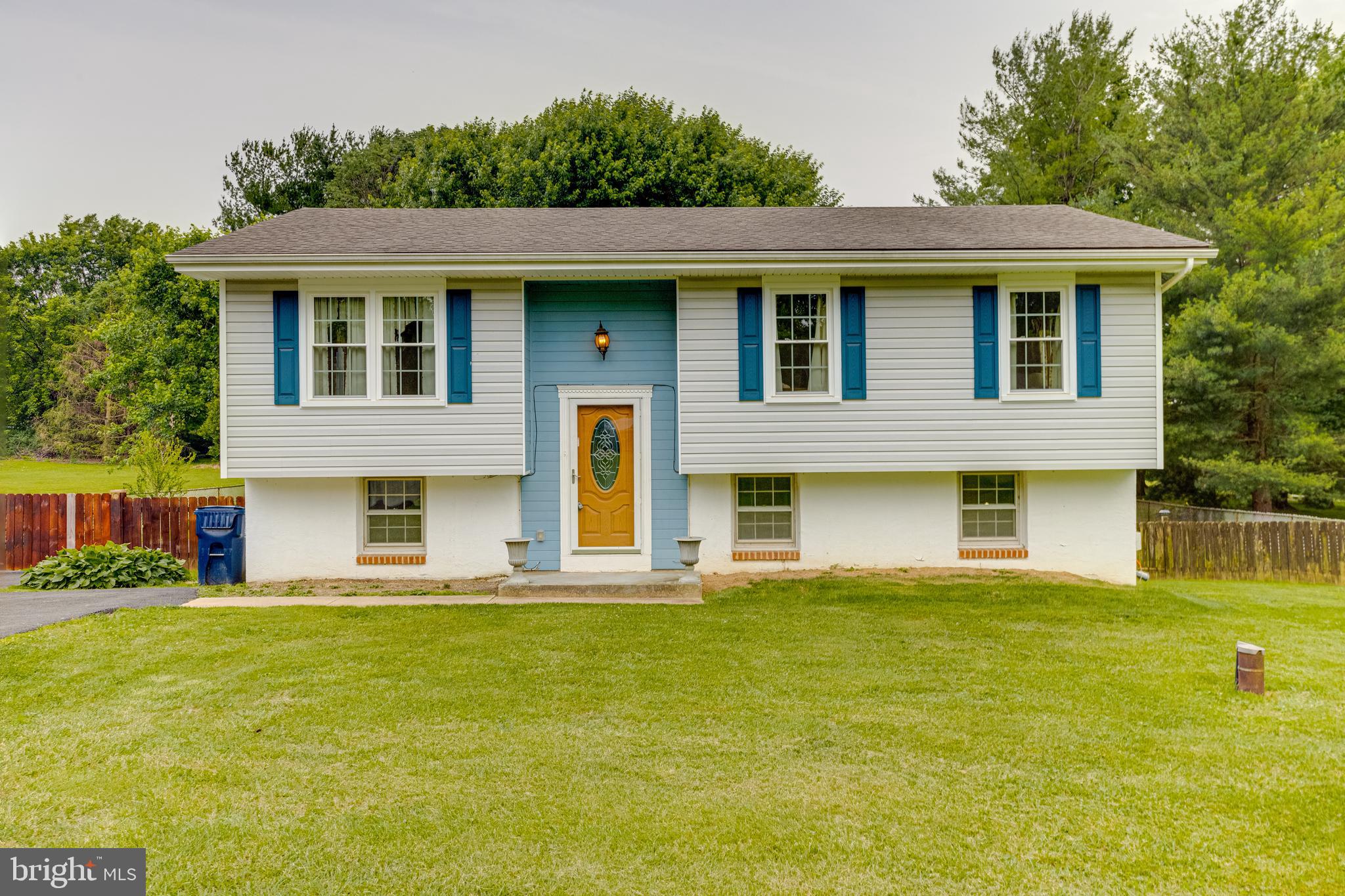 Welcome home! This beautifully updated 3-bedroom, 2-bath split-level home is perfectly situated on over half an acre in the highly sought-after Rising Sun School District. From the moment you arrive, you'll appreciate the space, comfort, and thoughtful updates throughout. The upstairs features two spacious bedrooms, a full bathroom, a bright living room, a dedicated dining area, and a functional kitchen that opens up to the brand-new deck — perfect for morning coffee or evening grilling.
Head downstairs to a fully finished lower level that offers even more living space, including a second large living room, a third bedroom, another full bathroom with a large soaking tub and stand-up shower, as well as a laundry and utility room. The lower level is a full walkout, providing convenient access to the backyard and tons of natural light — perfect for multi-generational living, guests, or just extra breathing room.
Recent improvements make this home truly move-in ready, including fresh paint and fresh carpet throughout, a freshly updated bathroom, and a recently updated septic system for years of worry-free ownership. The home is served by a private well, keeping your monthly costs down. Additional major updates include a newer roof, updated windows, updated siding, an updated Trane HVAC system, and an updated water heater, plus that massive brand-new deck overlooking the private, fully fenced backyard — ideal for kids, pets, and peace of mind.
For the hobbyist or anyone needing extra space, the oversized detached garage/workshop with a second-level loft is the ultimate bonus — great for storage, tools, toys, or your next big project. Homes like this don't come around often, especially in this location. Don't miss your chance to make it yours. Call today to schedule your private tour.