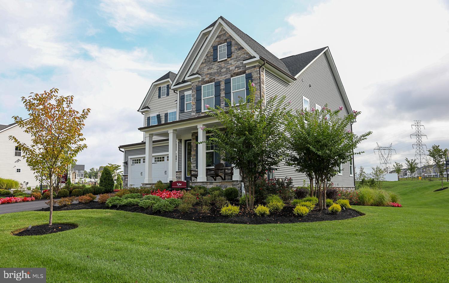 Back on the Market - This opportunity presents a renewed opportunity for buyers ready to move forward! 

Seize the incredible opportunity to own the former builders model home at Wellington Farms in North Laurel, Maryland! This luxurious corner lot NVHomes Tyler model showcases one of the most sought-after floor-plans, all nestled in a vibrant neighborhood just minutes from the upscale shops and dining of Maple Lawn.

This stunning home offers:

- 4 spacious Bedrooms, 4 full baths, and 1 half bath and an impressive 5,600 sq. ft. of beautifully designed fully finished living space
- A Finished Recreation Room, perfect for entertaining or relaxing with family and friends
- Chef's Kitchen featuring elegant Quartz Countertops and soft close Kitchen Cabinets, combining both style and functionality, including top-of-the-line Double Wall Oven and Gas Cooktop, catering to all your culinary needs
- Gorgeous Wide Plank Flooring throughout the entire First Floor, adding a touch of sophistication
- Towering 9’ Ceilings on all levels, creating an open and airy atmosphere
- A luxurious Owner’s Bedroom complete with a stunning Tray Ceiling for added elegance
- A Built-In Arrival Center with Bench & Shoe Storage, ensuring convenience right as you walk through the door
-Extended living under your cover back porch with a remarkable featured fireplace.

As the former model home for NVHomes, never lived in, every room is thoughtfully designed and ready for you to move in and enjoy. Plus, you'll be just steps away from Wellington Farms' exclusive amenities, including a sparkling community pool, modern clubhouse, and playground!

Don’t miss your chance to own this remarkable home—where luxury meets lifestyle in every detail. Make it yours today!