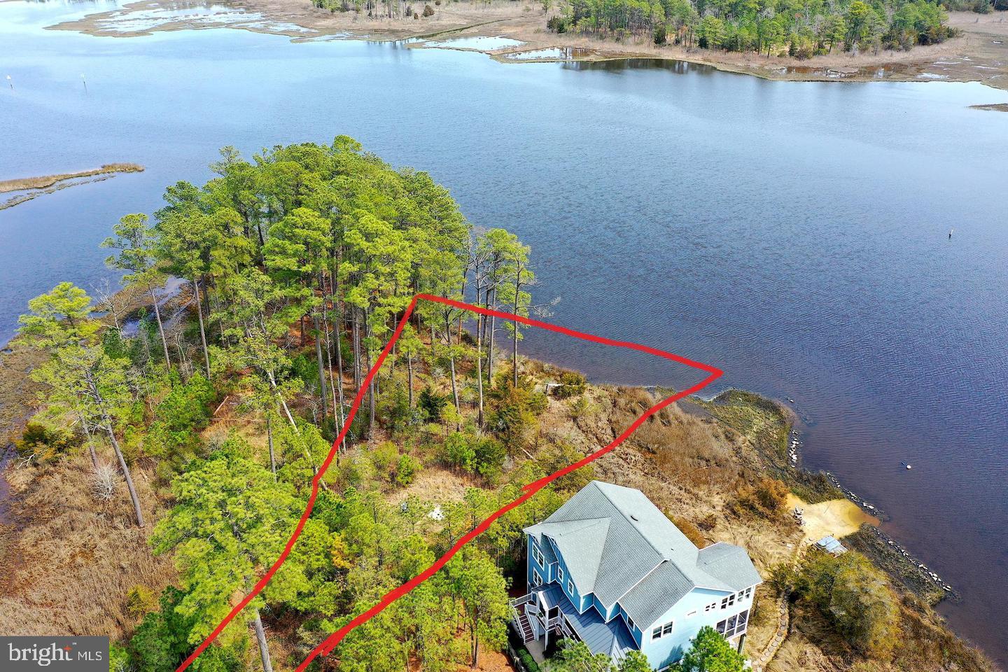 RARE WATERFRONT HOMESITE IN  the Gated Community of GLEN RIDDLE! ONE OF THE LAST FEW WATERFRONT LOTS REMAINING  in the prestigious, gated community of Glen Riddle — an incredible opportunity to build your dream home surrounded by luxury and natural beauty. This PREMIUM homesite offers expansive water views that are becoming even more impressive as additional trees are being cleared to create larger, unobstructed sightlines across the water.The groundwork has already been done for you — all utilities have been run to the lot, and a private blacktop bulkhead is already in place, saving significant time and development expense. This property is ready for your custom coastal vision to come to life.Glen Riddle is known for its outstanding resort-style amenities, including a private marina for boating, kayaking, paddle boarding, and other water activities, tennis courts, a community pool, elegant clubhouse, and a championship golf course. Enjoy waterfront dining right inside the community at the renowned Ruth’s Chris Steak House.Located just a few short miles from the beaches of Ocean City and the natural beauty of Assateague Island, this homesite offers the perfect blend of privacy, recreation, and coastal convenience.Opportunities like this are rare — contact the listing agent today for additional information and start planning your dream waterfront home.