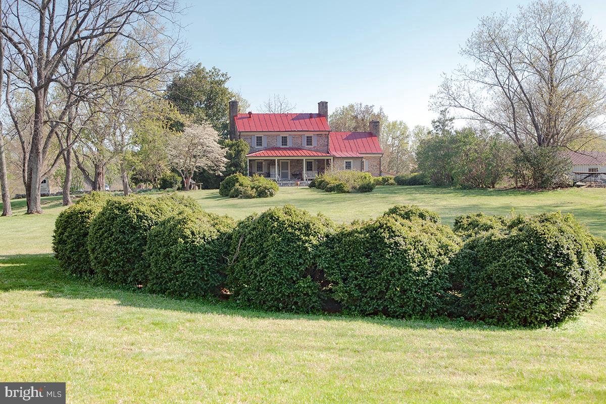 STONEHAVEN FARM is located between Culpeper and Sperryville on 158 Acres with expansive views from the front and gracious lawn and woodland to the back. This is a Private Retreat with charming 4 Bedroom stone residence, c. 1791, with 4 zone geothermal heating & cooling system and a generator. A 3 level stone cottage referred to as "Stones Throw" sits to the front of the home and a 3 Bedroom log cabin with gourmet kitchen is further up the Lane and tucked into the woods. The two level barn offers 3 stalls and a  tack room on the main level and a rustic gathering room on the second level; adjacent to the barn is a 3 car garage. This property offers beautiful mountain views, serenity, a pond and  miles of trails with tremendous ride-out and hiking potential in the  Thornton Hill Hunt Territory. Property is in easement with the Virginia Outdoors Foundation.