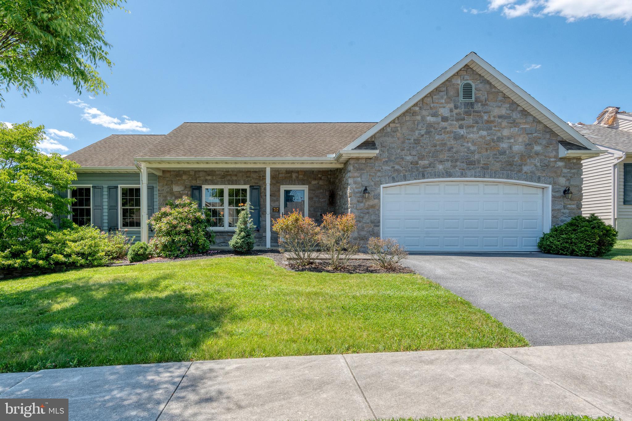 Enjoy one-floor living in this affordable and well-maintained ranch home in Brookshire 55+ neighborhood, just outside of Manheim. Open floorplan with vaulted ceiling, gas fireplace, back patio and versatile layout with a dining area, den/sunroom plus a designated office. This generous floorplan can adjust as your needs change.  With exterior design accents, there is great curb appeal, plenty of beds for gardening and a covered front porch, offering a peaceful place to sit. Brookshire offers easy walkability with sidewalks, a community center and a pond with a view. Just a mile to the local shopping center and a couple miles to downtown Manheim -great location!