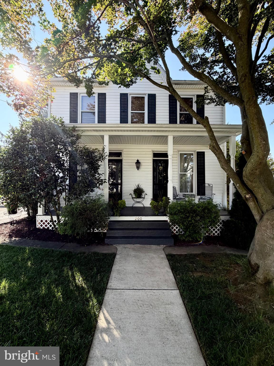 This home is an absolute MUST SEE. This home has been immaculately maintained and features all of it's original charm. You will fall in love with the beautiful hardwood floors throughout this spacious 5 bedroom, 3 full bath colonial that features 3,200 square feet of living space along with a large 832 square foot basement, with outside entrance. This classic beauty is situated on a large, beautifully landscaped and manicured, corner lot of .64 acres in Middletown's Historic District. You will fall in love with all of the historic charm and craftsmanship that blends seamlessly with modern upgrades such as vinyl siding and replacement windows. There are several bonus areas that provide added charm to this already captivating home. There is a family room that was crafted from a former garage, a second floor sunroom area for relaxing, a bonus room that could be a home office and a sitting area off of the formal dining room. This is a true gem and you will be amazed at the incredible condition.