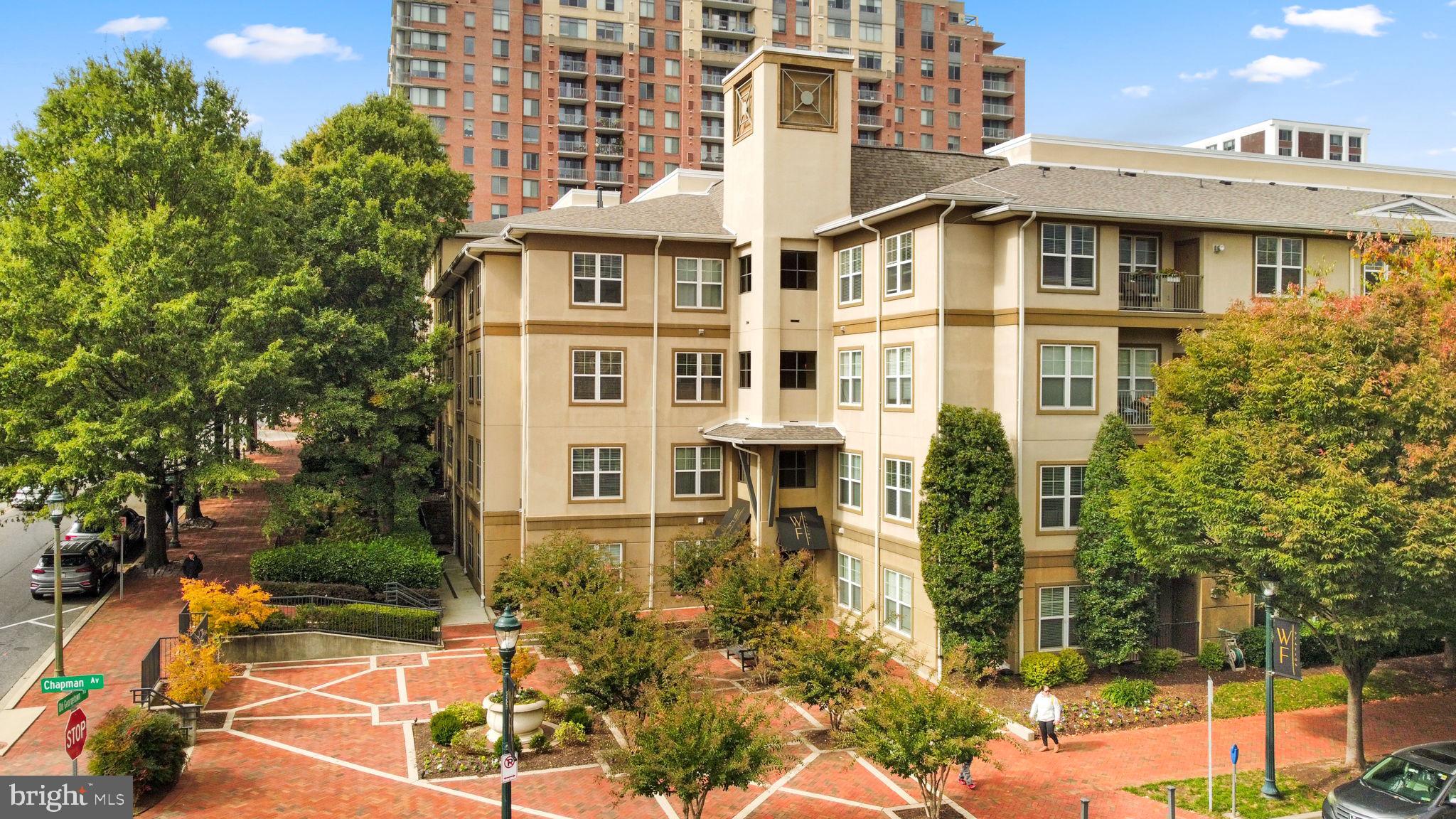 Welcome to this stunning 3-bedroom, 2-bath condo in the neighborhood favorite White Flint Station community — a true rare find in North Bethesda!

Offering over 1,500 square feet of thoughtfully designed living space, this exceptional unit features an expansive open-concept kitchen, dining, and living area perfect for both everyday living and entertaining. Cozy up with a warm cup of coffee on your private balcony watching the flower-filled courtyard below come alive with color. Cook in style in the chef-inspired kitchen boasting stainless steel appliances, a gas cooktop, and gleaming granite countertops. Three generously sized bedrooms provide the space and flexibility today’s buyers are looking for.

What truly sets this unit apart is its rare dual parking package — a private, deeded personal garage located just one floor below the unit, plus a second deeded parking space in the community garage. Convenience and peace of mind, all included. 

Step outside and find yourself just moments from the vibrant Pike & Rose shopping, dining, and entertainment district, and within easy walking distance of the White Flint/North Bethesda Metro station — making commuting a breeze. Just a short to every grocery store imaginable: Wegmans, Whole Food, Trader Joes, Giant, Aldi, and Moms Organic market. 

This is the one you’ve been waiting for. Don’t miss your chance to own this exceptional condo in one of Montgomery County’s most desirable communities!