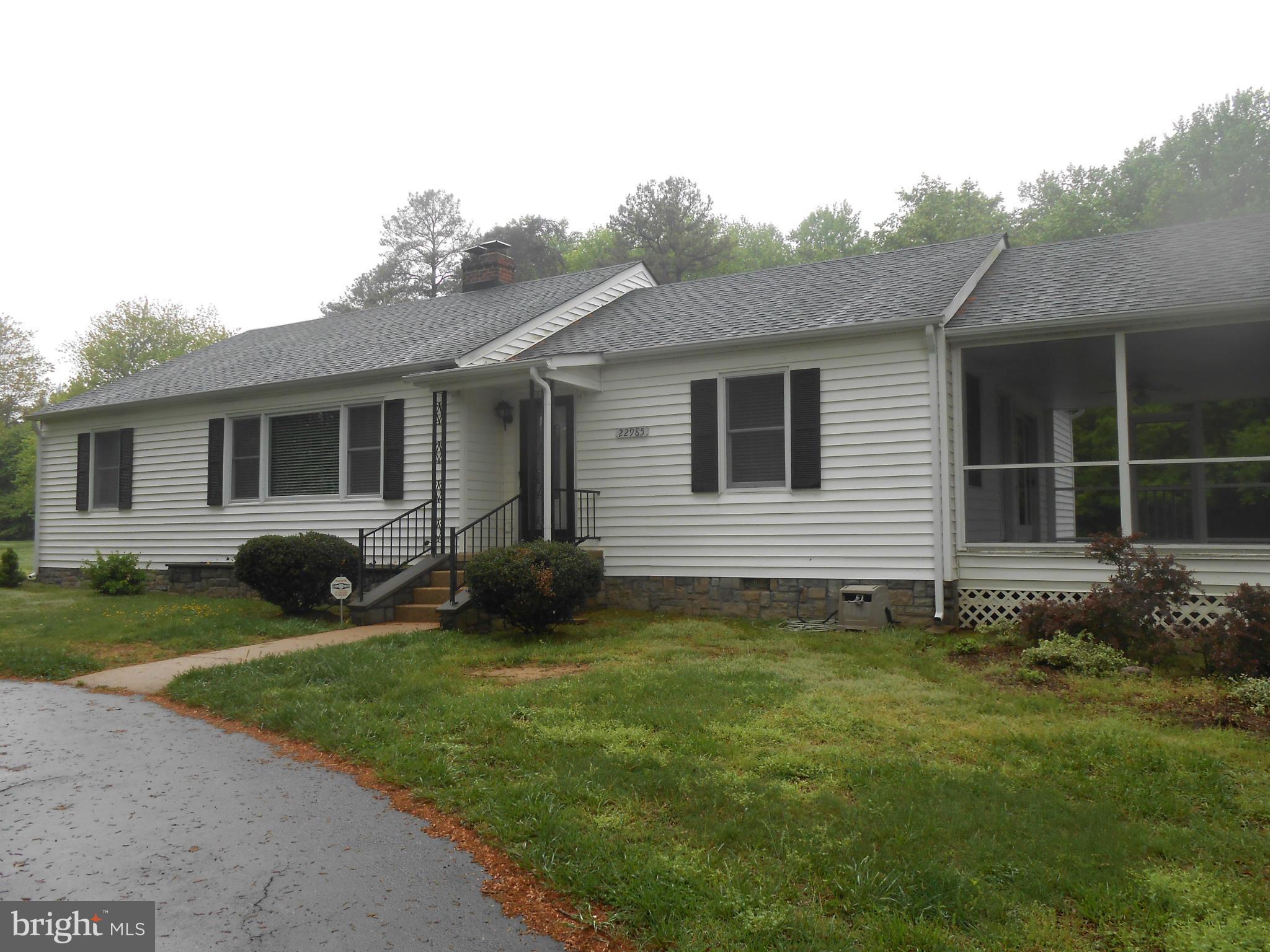 Picture perfect just move right in!! Charming 3 bedroom 2 full bath rambler in downtown Leonardtown. Hardwood floors, wood burning fireplace, tile screened in porch, circular driveway with lots of paved parking. Full unfinished basement to finish like you like.  Nice home.