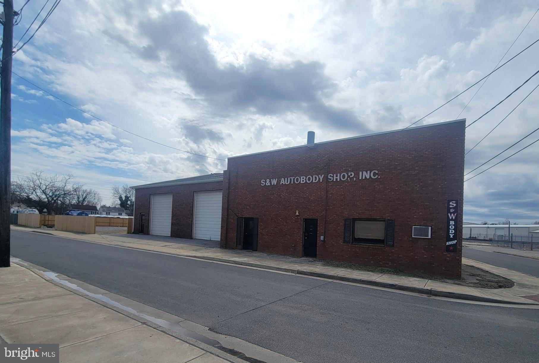 Just under a half acre of Commercial zoned property in Salisbury. This building features approximately 6,800 square feet that includes shop and office space. 6 roll up garage bay doors make shop access seamless. A new roof and 6' high stockade fence with gates are currently under construction. This address falls within a Maryland designated Opportunity Zone. Updated photos will follow when the current work in progress is complete.