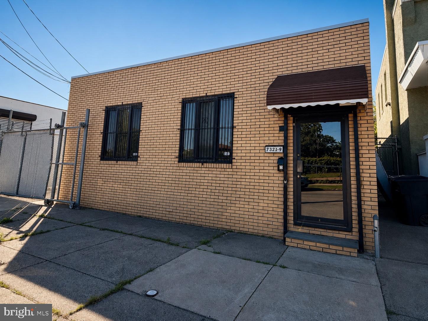 Position your business for growth with this versatile industrial property in Northeast Philadelphia, ideally located just minutes from I-95, Cottman Avenue, and Frankford Avenue. Offered vacant and ready for immediate occupancy, 7327 Edmund Street presents an exceptional opportunity for owner-users, contractors, distributors, light manufacturers, tradespeople, service businesses, investors, and warehouse operators seeking a strategically located facility with valuable upgrades already in place.

The building contains approximately 2,700+ square feet of flexible industrial space (buyer to verify), featuring 10-foot ceilings, durable concrete flooring, overhead lighting, ceiling fans, exhaust fan, newer windows, a newer roof, and a security system. The open layout offers adaptability for warehousing, distribution, fabrication, contractor operations, storage, showroom space, light manufacturing, and a variety of industrial and commercial uses permitted under Philadelphia’s I-2 Medium Industrial zoning.

Access and functionality are key highlights. The property features a front roll-up entry, a 60-inch-wide double side door, and an additional rear roll-up access point, creating efficient movement for equipment, inventory, and personnel. A gated side parking area provides secure off-street parking and outdoor storage potential.

Additional improvements include two powder rooms, a 100-gallon electric hot water heater, gas-fired HVAC, central air conditioning, and a dedicated HVAC/mechanical room. A small kitchenette area with cabinetry and countertop space adds convenience for employees and daily operations.

The building measures approximately 88’10” deep, with most of the structure spanning 28’8” wide and an expanded rear section measuring approximately 32’8” wide, offering flexibility for workspace configuration and operational efficiency.

Property Highlights: 
*Vacant and ready for immediate occupancy 
*I-2 Medium Industrial zoning 
*Minutes to I-95, Cottman Avenue, and Frankford Avenue 
*Approx. 10’ ceiling height 
*Concrete floors 
*Front and rear roll-up access
60” wide double side-door entry 
*Gated side parking/storage area 
*Newer roof and windows 
*Security system installed 
*Gas heat and central air 
*100-gallon electric hot water heater 
*Overhead lighting and ceiling fans 
*Two powder rooms 
*Small kitchenette area 
*Flexible layout suitable for a variety of industrial and commercial users