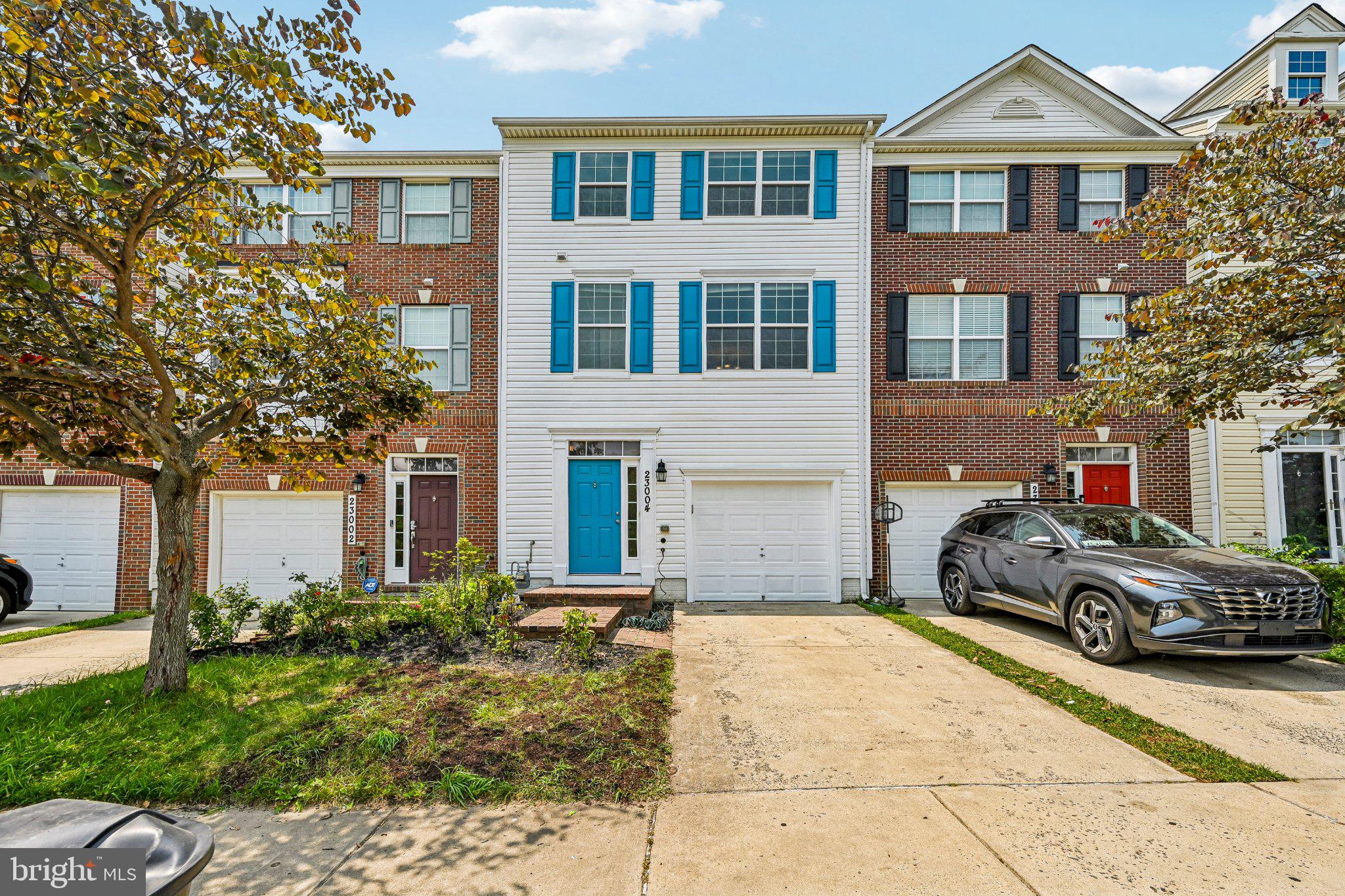Welcome to this beautifully maintained 3-level townhome in the highly desirable Arora Hills community of Clarksburg, featuring top-rated Montgomery County public schools and convenient access to major highways. This move-in ready home offers 3 spacious bedrooms, 2 full baths, 2 half baths, a 1-car garage, and an electric vehicle charging outlet.

The bright, open floor plan features 9-foot ceilings, gleaming hardwood flooring throughout the main level, brand-new hardwood steps, and abundant natural light. The entire home has been freshly painted, and the upper level showcases brand-new luxury vinyl flooring, adding a modern and stylish touch throughout. The gourmet kitchen boasts granite countertops, stainless steel appliances, ample cabinetry, and a large center island with a breakfast bar that opens to the dining area and spacious family room—perfect for everyday living and entertaining. Step outside to the rear deck overlooking the backyard, an ideal space for relaxing or hosting guests.

Major recent updates provide exceptional value and peace of mind, including a new HVAC system (2024), water heater (2022), and stainless steel refrigerator, dishwasher, and gas range—all replaced within the past year.

Upstairs, the spacious primary suite features a vaulted ceiling, walk-in closet, and an en-suite bath with double vanities, ceramic tile flooring, a soaking tub, and a separate shower. Two additional generously sized bedrooms and a full hall bath complete the upper level.

The finished lower level offers a versatile recreation room ideal for a media room, home office, fitness area, or playroom, along with a convenient half bath and additional storage.

Enjoy outstanding community amenities including a swimming pool, clubhouse, playgrounds, parks, tot lots, and scenic walking trails. Hallie Wells Middle School is within walking distance, while shopping, dining, and everyday conveniences are just minutes away.

Ideally located with easy access to Ridge Road, MD-355, and I-270, this home perfectly combines modern updates, comfort, convenience, and an exceptional location. Don’t miss this incredible opportunity to own a beautifully updated home in one of Clarksburg’s most sought-after communities!