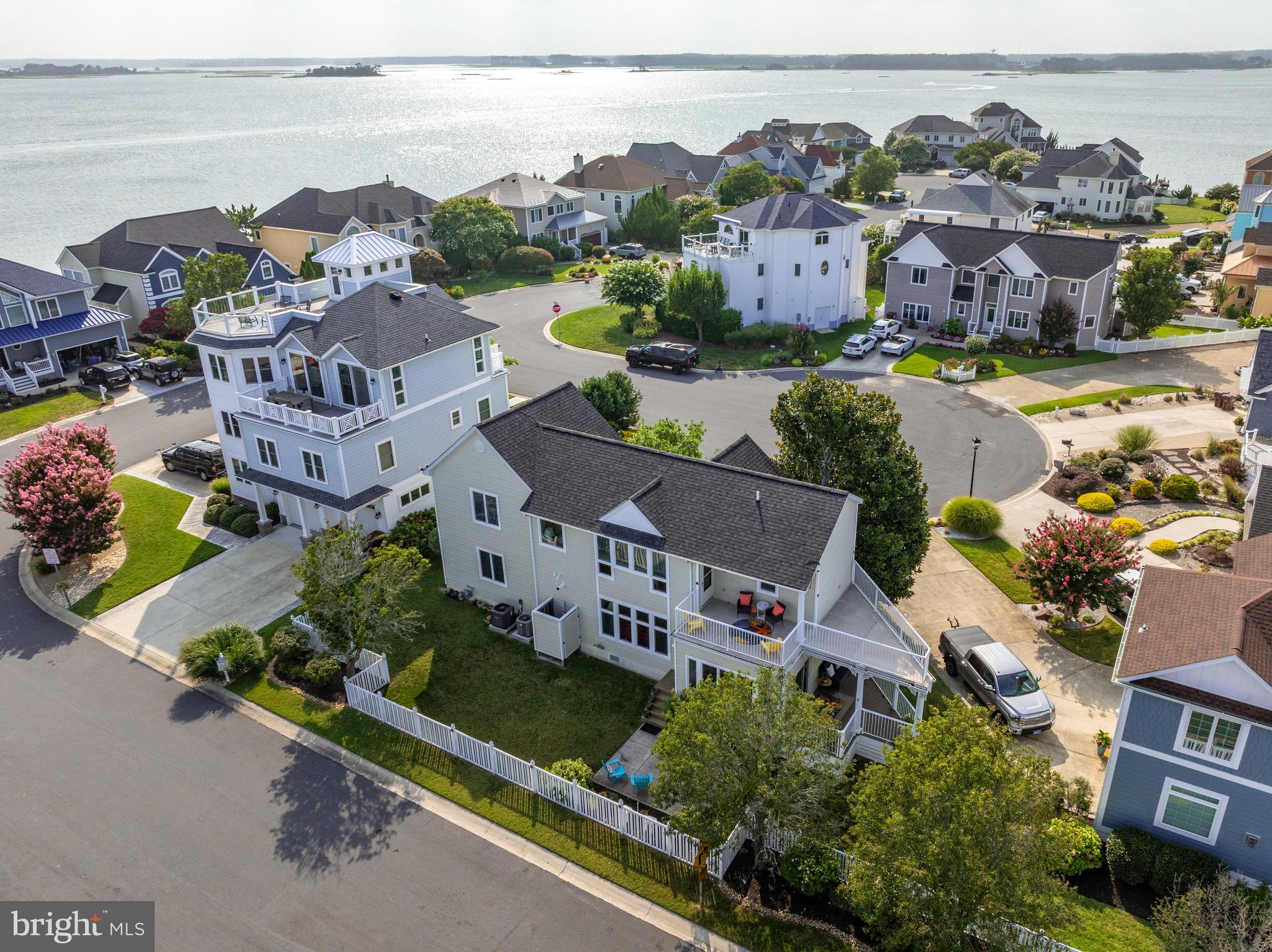 Welcome to this rare opportunity to own a beautifully maintained four-bedroom, two-and-a-half bath single-family home in the coveted waterfront community of Nantucket Point. Located on a peaceful cul-de-sac, this home offers the perfect blend of privacy, comfort, and coastal charm.
Lovingly owned by the original family for decades, this residence has been the backdrop for countless cherished memories. The home conveys with a deep-water boat slip at the private, gated community pier—just a short stroll away—along with access to the community pool, making it a boater’s and beach lover’s dream.
Step inside to find light-filled living spaces, including a cozy living room with a fireplace, a charming sunroom off the kitchen, and a spacious deck ideal for al fresco dining or quiet mornings with coffee. Large windows throughout the home bring in an abundance of natural light, accentuating the warmth and elegance of each room. Outdoors, the mature landscaping offers beauty and privacy, anchored by a stunning magnolia tree in the front yard. A partially fenced backyard, paver patio, outdoor shower, and lush greenery create the perfect coastal oasis.
Nantucket Point remains one of Ocean City’s best-kept secrets—a quiet, friendly enclave hidden away in North Ocean City, yet close to everything. Whether you’re looking for a serene primary residence or a luxurious coastal retreat, this is a rare chance to own in one of the area’s most sought-after waterfront communities Open House 4/19 canceled due to weather