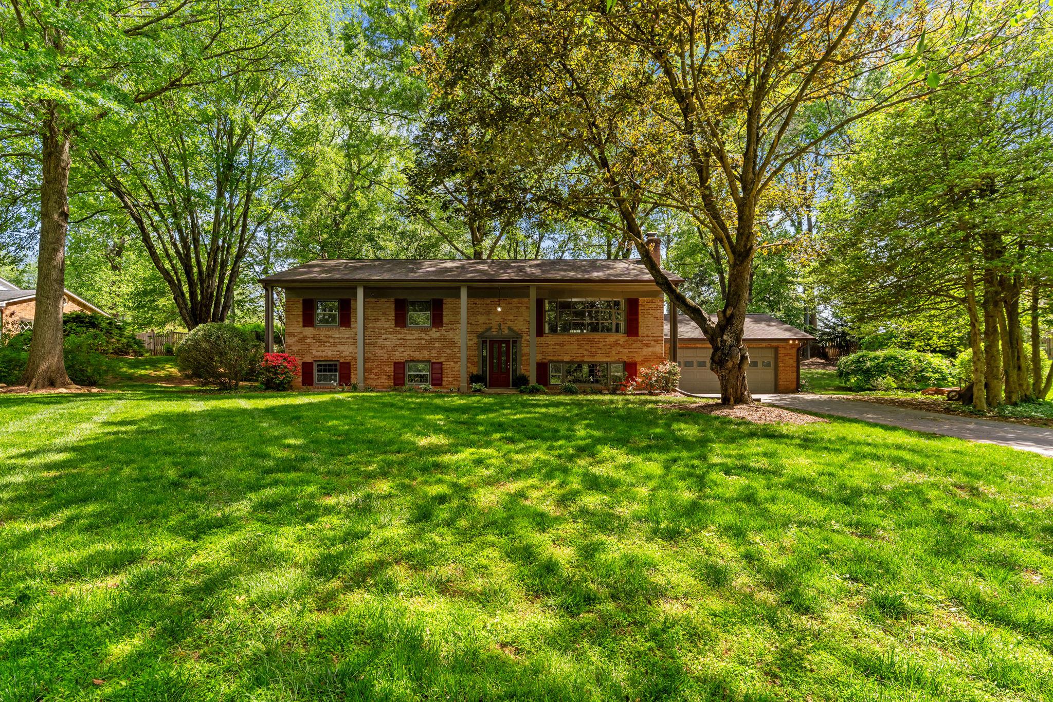 Nestled in the serene Crescent Hills Estates, this charming home exudes warmth and character.  Sited on a private 1 acre lot this lovely home is move-in ready and full of updates!   First time on the market, pride of ownership is reflected throughout.   Home showcases a blend of classic craftsmanship and modern comforts. The inviting interior features five spacious bedrooms and three full bathrooms, perfect for both relaxation and entertaining.  Gleaming refinished hardwood floors flow seamlessly through the main living areas, complemented by cozy carpeting in the upper level bedrooms. The formal dining room sets the stage for memorable gatherings and offers backyard views.  Wonderful outdoor views from the main level gathering room.  The lower level family room boasts a stunning brick fireplace with glass doors, creating a cozy focal point for chilly evenings. The fully finished daylight basement offers additional living space, 2 generous bedrooms, hall bath and storage complete with garage access and ample natural light from the windows. Step outside to discover a private oasis on a generous one-acre lot, partly wooded for added tranquility. The fenced-in gunite pool invites you to unwind and enjoy sunny days in your own backyard retreat.  Generous 2 level deck convenient to the kitchen perfect for hosting or relaxing.  With an attached front-entry garage and a spacious driveway accommodating six vehicles, convenience is at your fingertips. This property harmoniously blends unique architectural features with thoughtful design, making it a perfect sanctuary for those seeking comfort and style. Experience the charm and warmth of this delightful home, where every corner invites you to create lasting memories.  Great vegetable gardening area in upper left area of backyard.  Move today, start enjoying your summer tomorrow!
