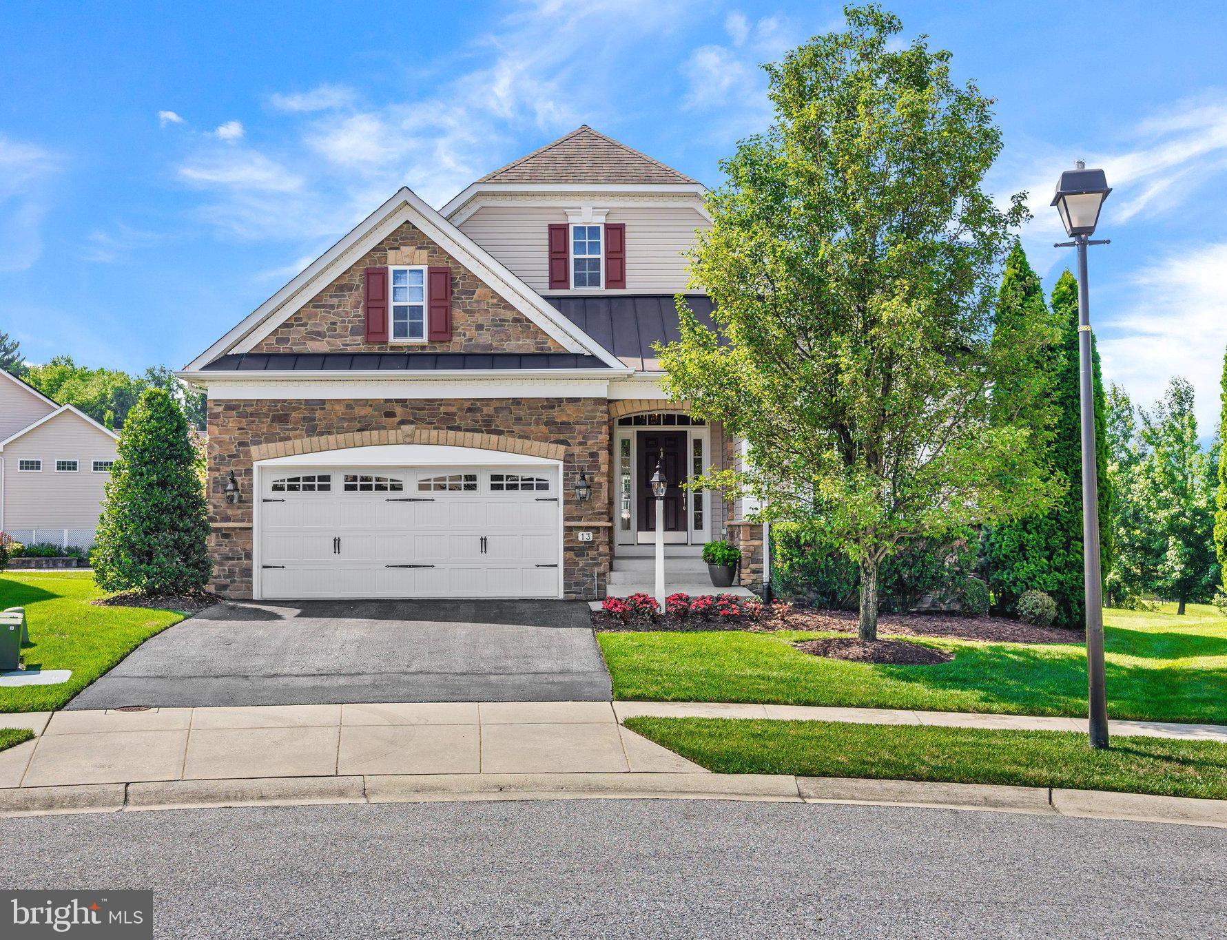 Welcome to this beautifully maintained two-story Koch home in the desirable 55+ community of Shipley's Crossing. Nestled on a quiet cul de sac and conveniently located just across the street from the community clubhouse, this home offers comfortable living in a location you'll love. Built in 2012 and gently lived in, the home has been freshly painted inside and out and has been well cared for, making it truly move in ready. The open floor plan features high ceilings, plenty of natural light, beautiful crown molding throughout, and spacious living areas that flow easily from room to room. Two stone gas fireplaces, one on the main level and one on the finished lower level, add warmth and character to both living spaces. The climate controlled four season room is the perfect place to enjoy your morning coffee, unwind with a good book, or entertain friends any time of year. The finished lower level also includes a kitchenette and a versatile bonus room that can easily serve as a home office, fitness room, hobby space, or guest room. A recently replaced exterior HVAC July 2026 system provides added peace of mind for years to come. If you've been looking for a home that's been thoughtfully maintained, offers plenty of space, and is located in one of the area's most welcoming active adult communities, this is one you won't want to miss!