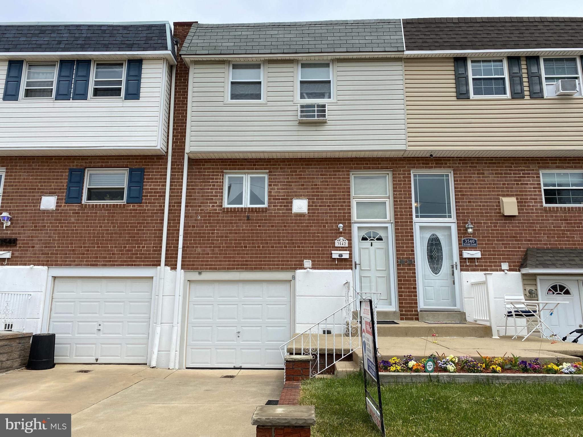 Great solid townhome on a prime block in desirable Morrell Park ! Dont miss out -  Newer roof ( 2years) , Heater ( 3yrs) , newer cement front .  Hardwoods under carpets 2nd ansd 3rd floors . Updated hall bath with ceramic tile floor , tub enclosure . 3 nice bedrooms with hardwoods and 3rd br with newer wall a/c unit .  Clean functional kitchen with gas cook top and wall oven . Large dining room with carpets and chandelier . Middle steps separate the living room and dining room . Finished basement with exit door to rear yard , cement  patio and fenced lawn . Garage with inside access , newer garage door . Laundry hall . Basement powder room .