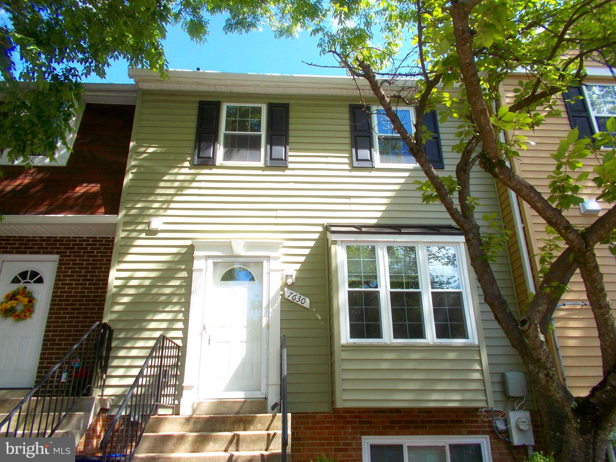 Beautifully updated and maintained townhome in quaint and quiet neighborhood.  Brand new granite countertops, dishwasher and flooring; stainless steel appliances.  Freshly painted with new carpeting.  Raised hearth wood-burning fireplace in family room.  Sliding door off dining room to enjoy spacious deck overlooking fenced-in flagstone patio courtyard beneath.  Powder room off  family room on main level. 3 generous bedrooms, and 2 full baths up.  HVAC 2 yrs. -- HWH 3 years new!  Upgraded/updated Andersen windows, front door.  Plumbing completely upgraded.  Partial basement houses HWH, laundry, and has a walk-out.  Amenities include swimming pool and tot lot(s).  Conveniently located and in close proximity to Baltimore, Washington, and Ft. Meade.  Charming downtown nearby Laurel boasts unique shops and fine dining.