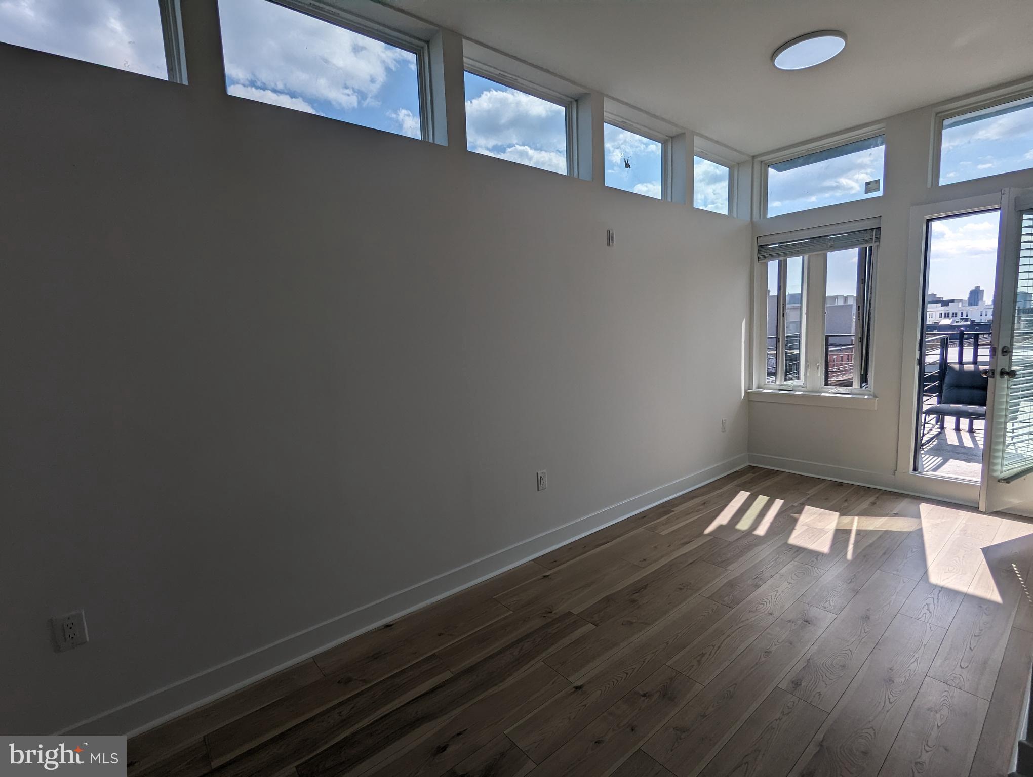 *Listed price reflects current special 1 month free on a 14 month lease

Listed price reflects current special 1 month free on a 14 month lease Introducing 100 W Susquehanna St #4, a stunning bilevel 1-bedroom, 2-bathroom loft-style apartment in Norris Square!  Private deck with city views, ½ block from Norris Square Park, hardwood floors, and large windows that fill this corner unit with natural light.

The kitchen boasts stainless steel appliances including dishwasher, microwave and disposal, and  ample cabinetry. Use the den area as an spacious office spare bedroom or entertainment area. Enjoy the convenience of in-unit laundry and the luxury of walk-in closets for all your storage needs. The private balcony space is perfect for outdoor dining or simply relaxing after a long day. 

This unit is located less than a block from vibrant Fishtown, where you'll find a plethora of local dining, shopping, and entertainment options. Don't miss the opportunity to make this beautiful loft-style apartment your new home! Schedule a viewing today and experience the perfect blend of industrial and modern design in a prime location. Private Gated Parking Space Available - $200/mo - Limited Availability