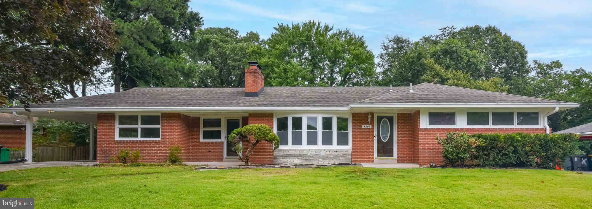 List price is Opening Bid at The Online Only Auction Sale to Be Held on The Auctioneers Website – Bidding begins Saturday, August 1st and ends Thursday, August 6, 2026 at 1:00 PM. a Spacious Renovated Brick Rambler located in the desirable Birmingham Estates community of Beltsville. Welcome to 4302 Yates Road, a spacious brick rambler located in the desirable Birmingham Estates community of Beltsville. Situated on a generous 0.32± acre lot, this well-maintained home offers approximately 1,706± above-grade square feet and 3,687± total square feet of living space, featuring 5 bedrooms, 3 full bathrooms, and a flexible floor plan ideal for a variety of living arrangements. The main level features a bright and inviting living room highlighted by a wood-burning fireplace, a separate dining room with decorative moldings, and a renovated kitchen with a skylight that fills the space with natural light. Hardwood flooring enhances much of the main level. The primary bedroom and additional bedrooms provide comfortable accommodations for family, guests, or a home office. The finished lower level significantly expands the living space with a large recreation room featuring a second fireplace, additional bedrooms, abundant storage, and ample room for multigenerational living, a home office, fitness area, or future customization. Additional highlights include renovated bathrooms throughout, central air conditioning, a classic brick exterior, a covered carport, a storage shed, and a spacious backyard offering endless possibilities for outdoor entertaining, gardening, or recreation. Ideally located near I-95, I-495, Route 1, the ICC (MD-200), MARC Rail, shopping, dining, parks, and major employment centers including the University of Maryland, NASA Goddard Space Flight Center, and the FDA campus, this home offers exceptional convenience with easy access throughout the Washington-Baltimore corridor.
