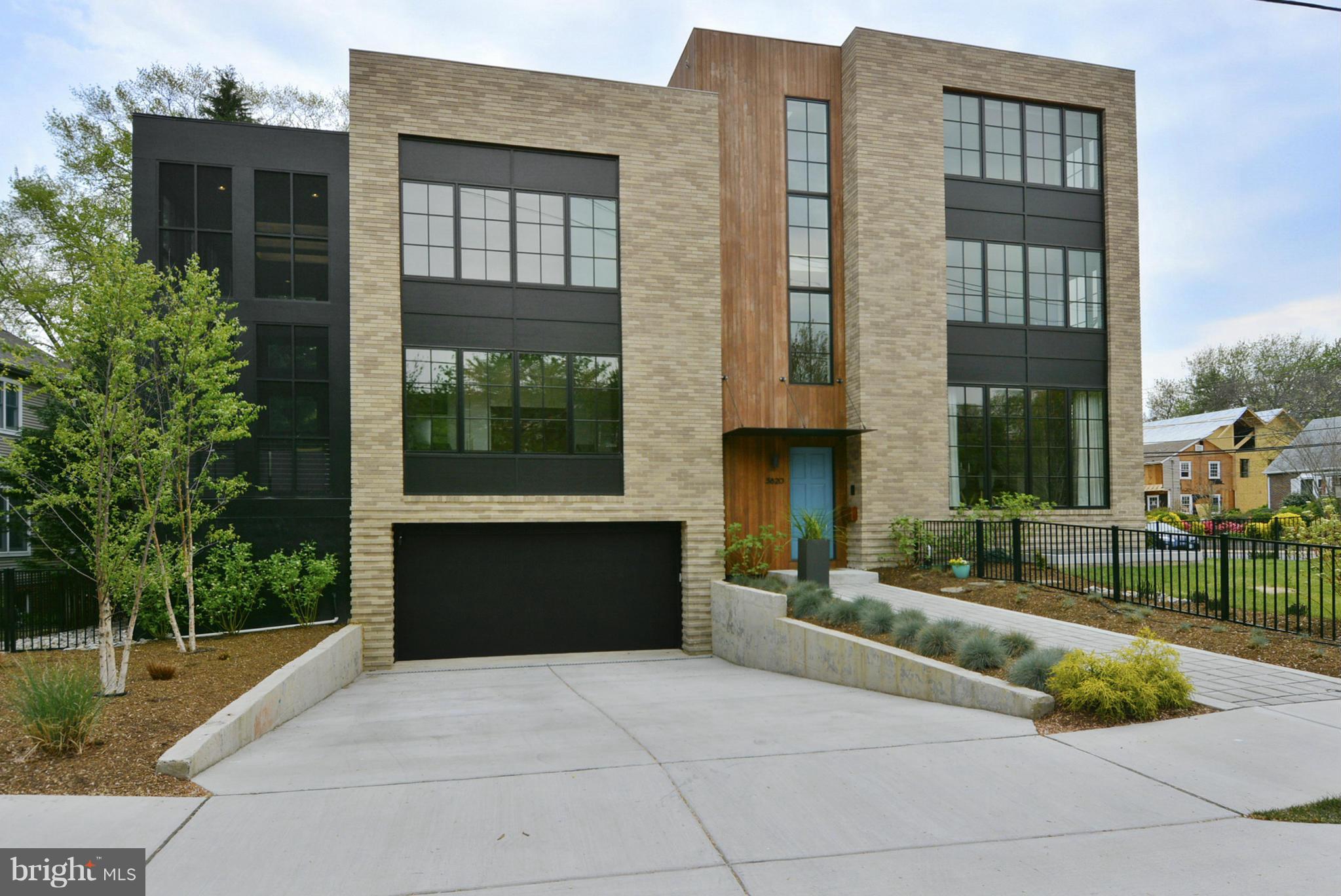 ONE-OF-A-KIND MODERN Home by SAGATOV DESIGN+BUILD! Luxury 4 level home with high end finishes to include chevron walnut floors, stainless steel ribbon detail custom staircase, exposed brick interior walls, custom built-ins in every room, designer lighting throughout, two story screened porch,roof top deck and rec- room with full wet bar, entertaining kitchen, mud-room, fitness room.