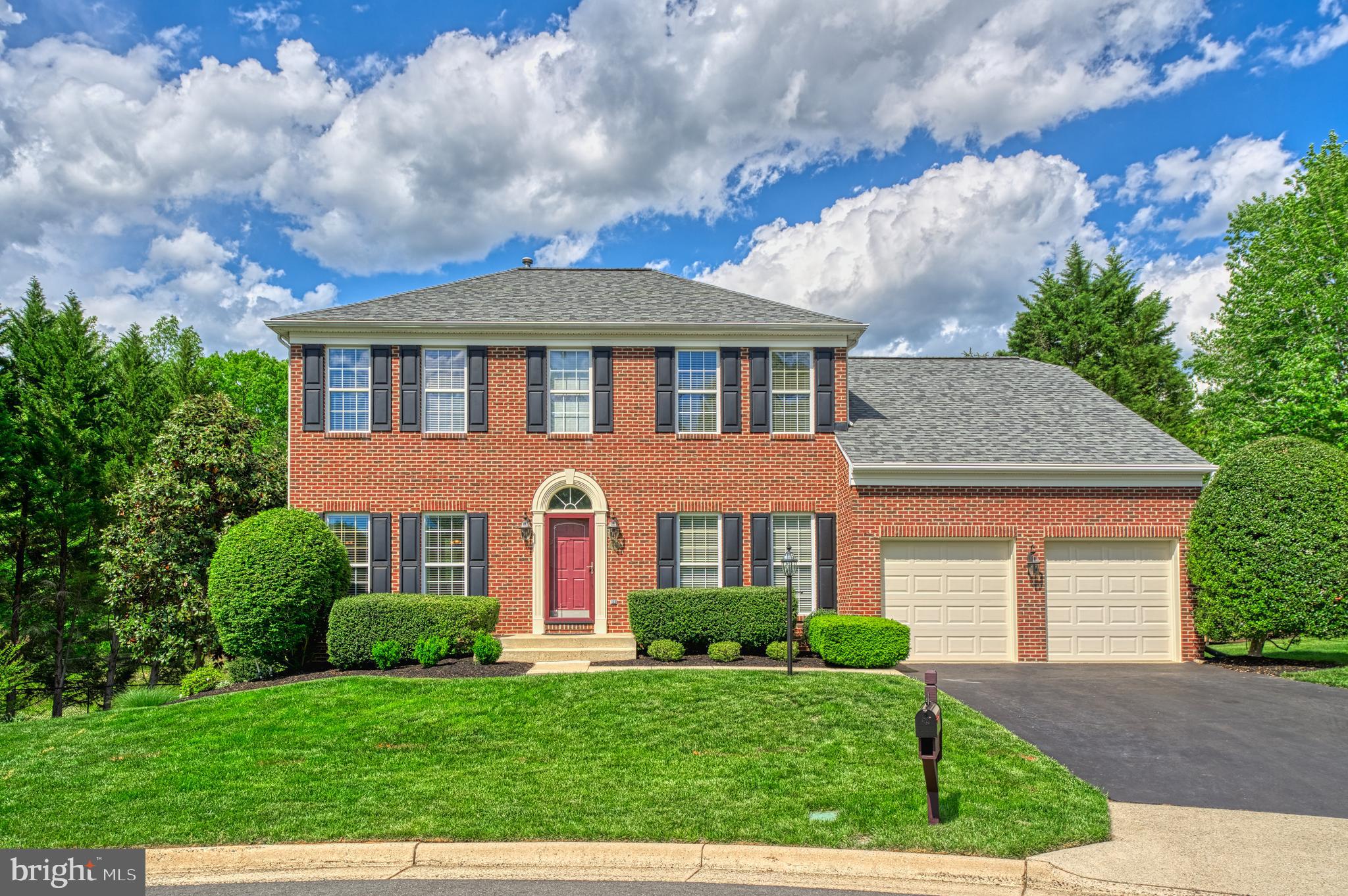 Welcome to this brick front colonial in the sought-after Brittany neighborhood, situated on a quiet cul-de-sac, steps to Prince William Forest Park. Thoughtfully updated and well-maintained, this home features hardwood floors on the upper two levels, a bright two-story foyer, and 9-foot ceilings with recessed lighting throughout the main level.
The main level offers a dedicated home office with built-in shelving, an elegant living room with crown molding, and a formal dining room with a bay window. The fully renovated kitchen is a standout with Kraftmaid cabinetry, slow-close drawers, pull-out storage, granite countertops, expanded island, and stainless-steel appliances, and a windowed breakfast nook with views of the backyard.
The adjacent family room features cathedral ceilings, a gas fireplace, and a wall of windows that connects the outside with the inside.  Step through the French door to a screened-in porch, perfect for relaxing or entertaining, complete with a grilling area and steps that lead down to a private backyard and wooded trail.
Upstairs, you'll find four bedrooms, all with custom closets. The primary suite includes a walk-in closet and a spacious bathroom with dual sinks and a soaking tub. One of the secondary bedrooms is currently being used as a large walk-in closet but can easily be returned to a traditional bedroom setup.
The walk-out basement offers a large rec room, full bathroom, and two storage areas, and makes the ideal spot for guests, hobbies, or movie nights.
Set on a peaceful lot, this home offers the perfect balance of comfort and function in a sought-after location.
The Brittany neighborhood is surrounded by Prince William National Forest with walking paths and trails throughout. Brittany Neighborhood Park has basketball, tennis, volleyball, commuter parking and more. The commute to the Pentagon and DC is easy with a bus stop at the neighborhood entrance, and easy access to I-95. Convenient shopping and dining are just minutes away at Fortuna Center Plaza. 
Don’t miss this opportunity to own a beautifully updated home in an unbeatable location! 
Roof 2023, HVAC 2017, Hot Water Heater 2024, Dishwasher 2025, Wall oven 2022, Disposal 2022, Refrigerator 2013, Washer and Dryer 2018
