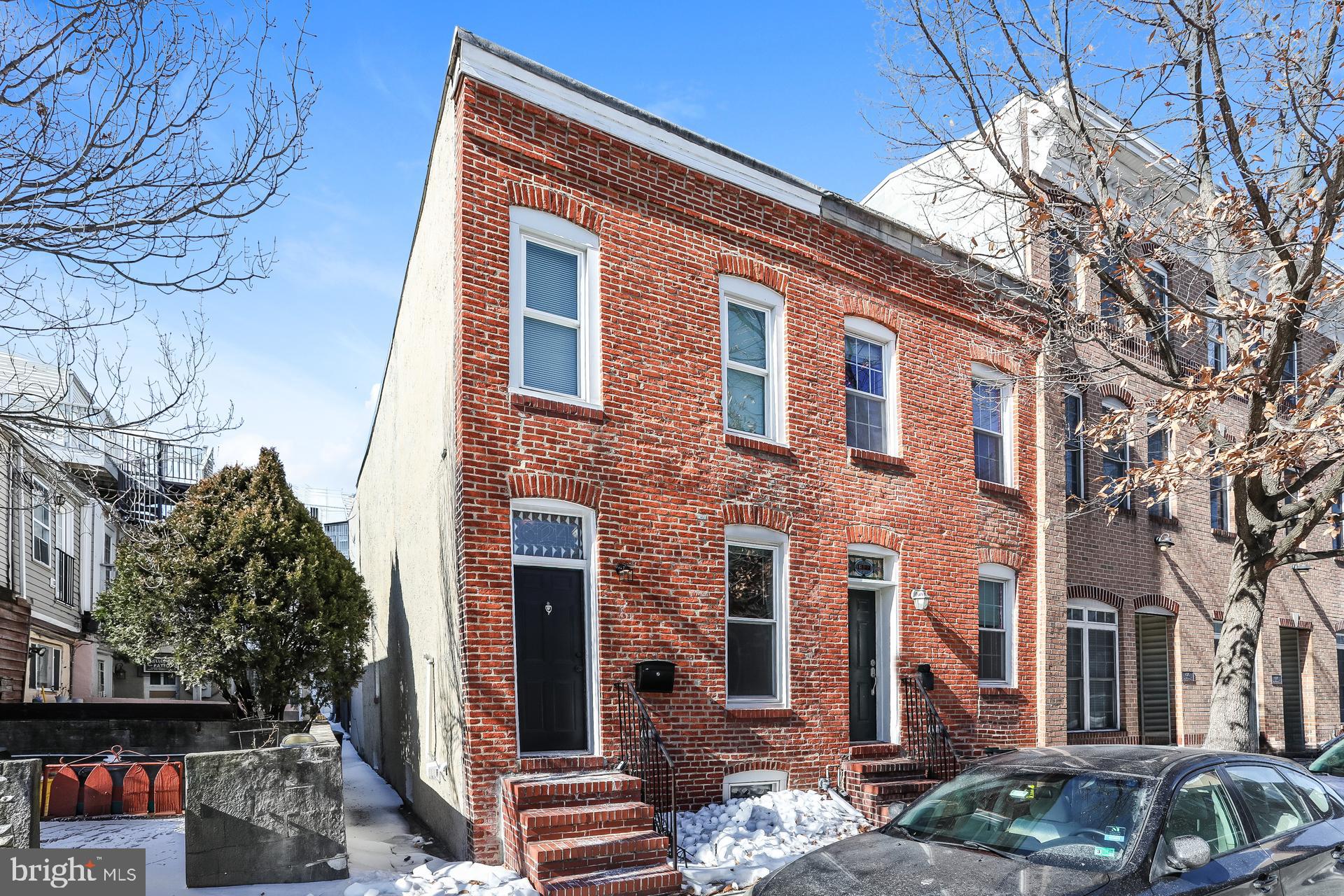 NEW PRICE! Welcome to 624 S Glover St, a picture-perfect Federal-style row home nestled in one of Baltimore’s most beloved neighborhoods—Canton. With 3 bedrooms, 2.5 bathrooms, and timeless charm throughout, this move-in ready home effortlessly blends classic Baltimore architecture with modern comfort. Step inside to a warm and inviting living space featuring exposed brick, rich hardwood flooring, and fresh neutral paint. A touch of elegance awaits at the entry, where stained glass above the front door adds a nod to the city's historic character. The open floor plan flows seamlessly into a bright kitchen boasting gleaming countertops, ample cabinetry, and direct access to a fully fenced backyard. Upstairs, the home offers two spacious bedrooms and two full bathrooms. The primary bedroom features a private deck. With sunlight flooding in and thoughtful touches throughout, this home checks all the boxes for comfort, style, and location. If you're searching for the walkable lifestyle of Canton, this gem is not to be missed!