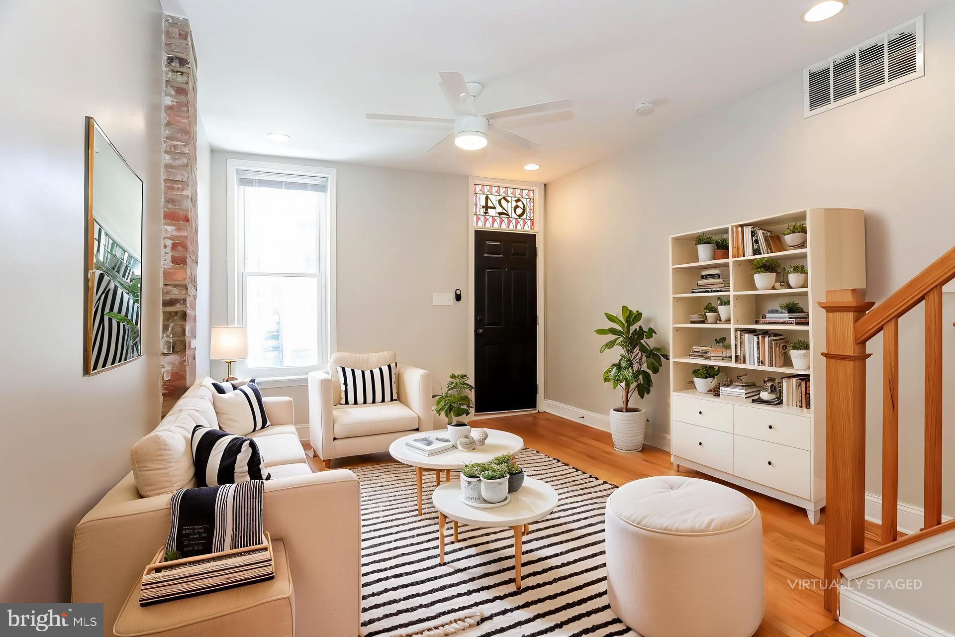 NEW PRICE! Welcome to 624 S Glover St, a picture-perfect Federal-style row home nestled in one of Baltimore’s most beloved neighborhoods—Canton. With 3 bedrooms, 2.5 bathrooms, and timeless charm throughout, this move-in ready home effortlessly blends classic Baltimore architecture with modern comfort. Step inside to a warm and inviting living space featuring exposed brick, rich hardwood flooring, and fresh neutral paint. A touch of elegance awaits at the entry, where stained glass above the front door adds a nod to the city's historic character. The open floor plan flows seamlessly into a bright kitchen boasting gleaming countertops, ample cabinetry, and direct access to a fully fenced backyard. Upstairs, the home offers two spacious bedrooms and two full bathrooms. The primary bedroom features a private deck. With sunlight flooding in and thoughtful touches throughout, this home checks all the boxes for comfort, style, and location. If you're searching for the walkable lifestyle of Canton, this gem is not to be missed!