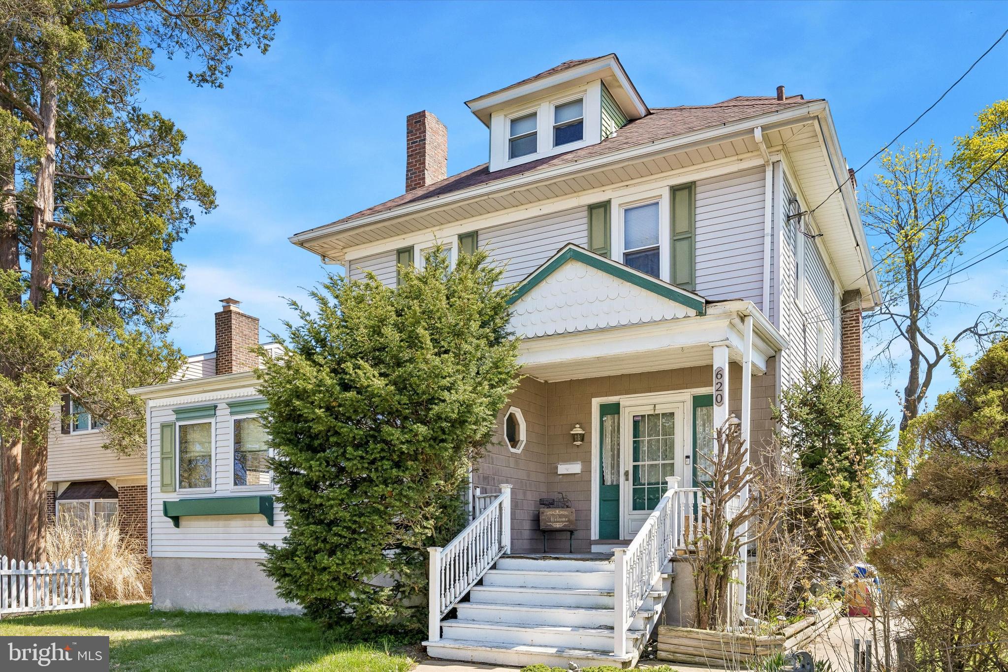 Step into this charming Victorian home, full of character and timeless appeal. A covered front porch welcomes you into a spacious entryway, setting the tone for the home’s classic layout. The main level features a living room with a brick fireplace and an adjoining bonus room—perfect for a home office, reading nook, or additional living space.

The layout continues into the dining room and an inviting sun-filled living area. One of the home’s standout features is the custom wood-and-glass sunroom, offering a bright and versatile space overlooking the backyard with direct access to the side deck—ideal for relaxing or entertaining.

The kitchen includes an island and plenty of cabinet space, making it both functional and full of potential. Upstairs, the second level offers three bedrooms and a full bathroom. The third floor adds even more flexibility with an additional bedroom and full bath—perfect for a private guest suite or creative space.

The home also features an unfinished basement for storage and a spacious backyard for outdoor enjoyment. Rich in original character, it offers the perfect canvas to update and make your own.