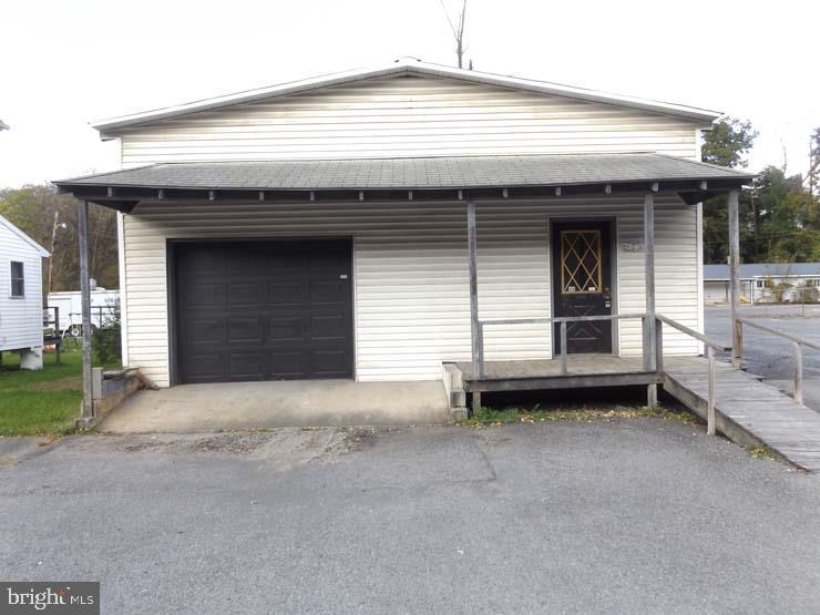One level commercial building just off Electric Ave on Kish Pike! 1792 SF containing 3 rooms and 1 car garage. Bring your existing business or start a new one with cost effective start up. 3 phase power in building. Many possibilities on this one. Need open space? Remove the partitions.. Seller has discontinued business as a gun repair shop. Motivated Seller. Please bring offers.,3 Phase Electric