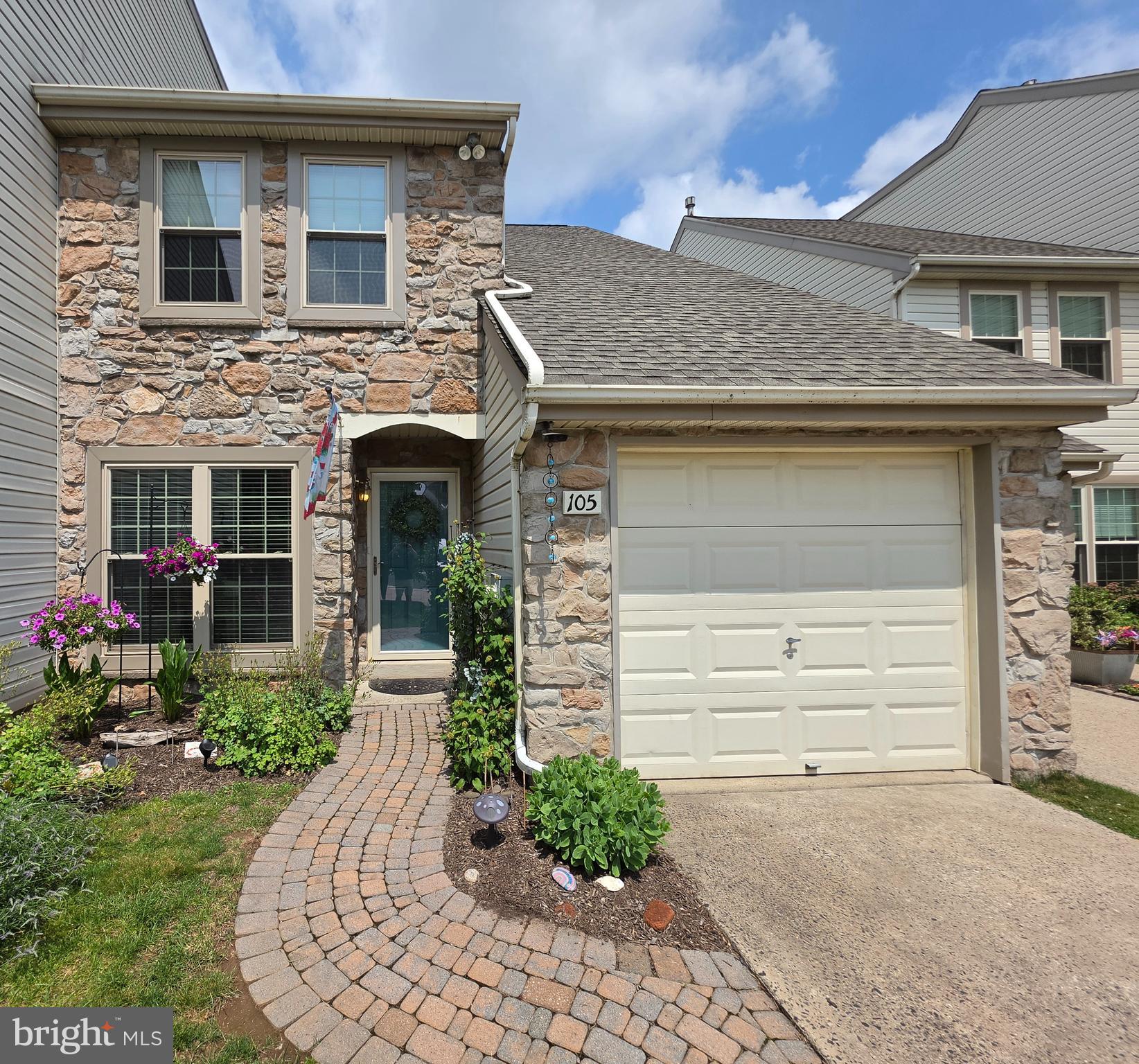 Welcome to 105 Larkspur Ct conveniently located in New Britian Twp!  This 3 Bedroom, 2.5 Bath townhome offers an updated kitchen, new Pella windows, a spacious entertaining area, a driveway for plenty of parking, and so much more!  As you enter through the front door of this home, you will be greeted by the modern eat-in kitchen with cabinets that offer a lot of storage space.  From there, you have access to the one car garage, the half bathroom, and access to the dining room, and the inviting living room.  The windows and the sliding door in the living room provide a lot of natural light in the afternoon and also invite you out to the updated Trex deck area that provides a backyard oasis for grilling, relaxing, and gatherings.  As you proceed up to the second floor, you will find the primary bedroom and bathroom to the left of the top of the stairs, the main bathroom and the laundry area directly at the top of the stairs, and the other two bedrooms to the right of the stairs.  The primary bedroom also includes a walk-in closet that is connected to the primary bath for convenience while the second and third bedrooms also provide a lot of storage space.  The second-floor laundry is located in its own room that also provides a considerable amount of storage!  Showings for this property begin on 6/16/26, so make sure to come see this well-maintained property while it lasts!