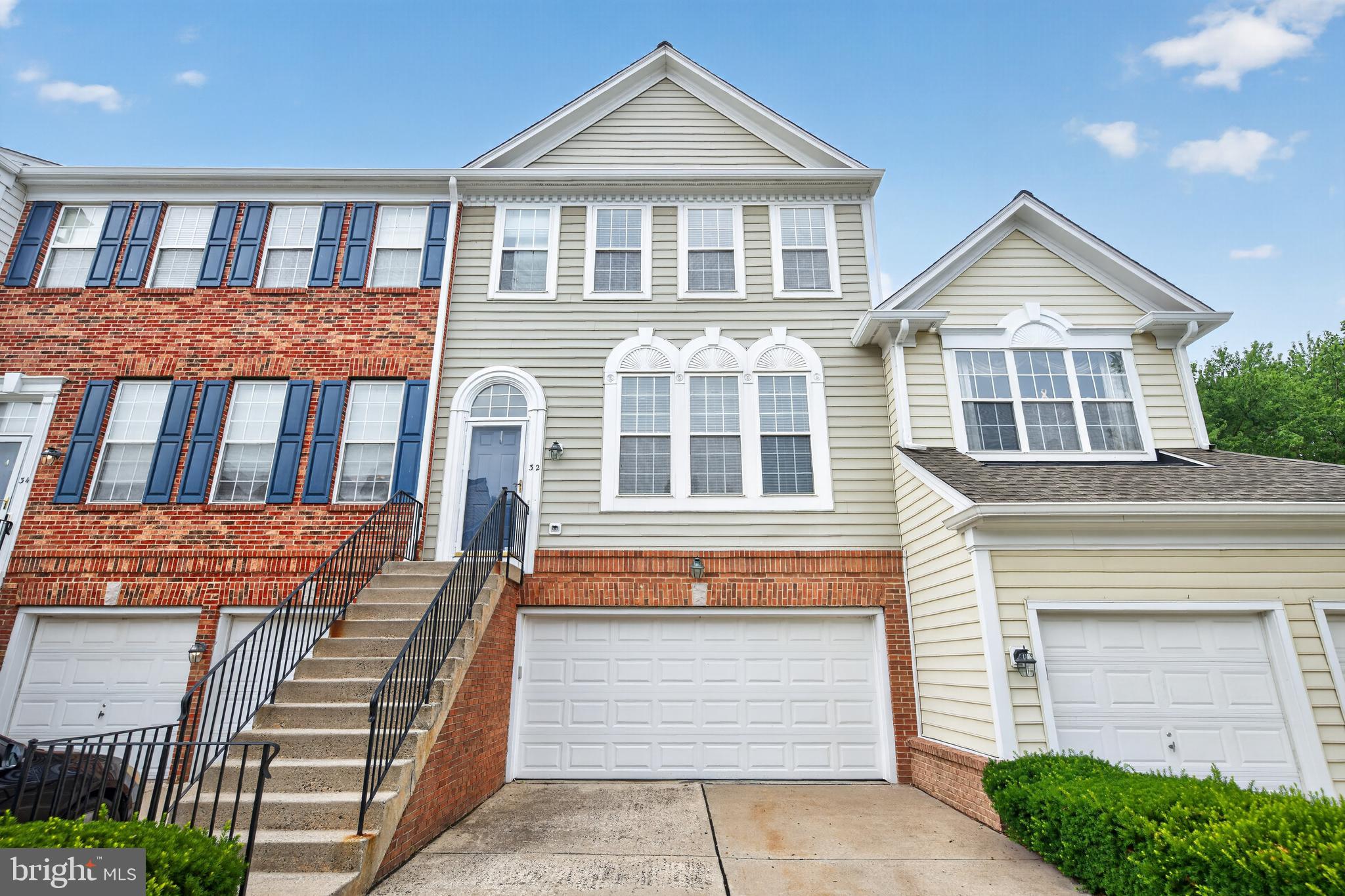 Spacious 3 bedroom 2.5 bath modern townhome in the desirable Doylestown Station which is minutes from the downtown Doylestown Boro.   Walk up stairs and through front door into large open concept floor plan featuring a large living room and dining room with beautiful hardwood flooring throughout which open to a family room with gas fireplace.  Off family room contains a large kitchen with island. The kitchen offers plenty of cabinets, tile back splash, stainless steel appliances and counter space.  Off the kitchen is an exterior glass door which leads to a private elevated rear deck overlooking a wooded area perfect for seasonal entertaining.   Main floor also contains a half bathroom.  Walk upstairs to three spacious bedrooms including large owner's suite with walk-in closet and full bathroom which includes double vanity, stall shower and soaking tub. Additionally top floor includes a full bathroom and laundry room. which is conveniently located.  Walk down to lower level which is fully finished bonus room perfect for entertaining and includes a second gas fireplace and sliding doors which lead to private back yard. Lower level also contains an attached 2-car garage.  *** Central Bucks School District ***   Walking distance to Kutz Elementary School, Kids Castle and walking trails.  Make your offer today!
