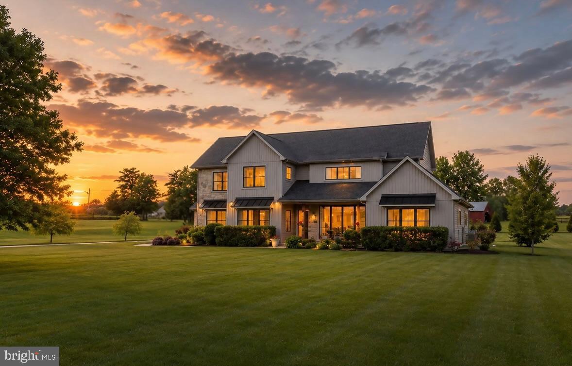 Welcome to 4 Walton Drive in Lindenwood Estates, where luxury, privacy, and breathtaking countryside views come together to create an extraordinary place to call home.  Set on 2.42 picturesque acres and surrounded by farmland and protected open space, this exceptional custom-built home is the one everyone stops to admire.  Designed to capture abundant natural light and showcase the stunning views from nearly every room, the home offers over 3,300 square feet of thoughtfully designed living space that seamlessly blends elegance with everyday comfort.  The soaring two-story family room is a showstopper, featuring a dramatic floor-to-ceiling gas fireplace, oversized windows, and sweeping views of the surrounding countryside and your sparkling pool.  At the heart of the home, the gourmet kitchen is designed for gathering, complete with granite countertops, a large center island, stainless steel appliances, and effortless flow into the main living areas.  A large butler's pantry, private office, spacious laundry room, and mudroom provide both convenience and functionality.  The main-level primary suite offers the ease of first-floor living and serves as a private retreat, featuring a spacious walk-in closet and a recently renovated spa-inspired bath with a gorgeous freestanding soaking tub, oversized glass walk-in shower, and double vanities.  Upstairs, three generously sized bedrooms, two full baths, and a large bonus room provide endless flexibility as a 5th bedroom for guests, a home office, fitness studio, or additional living space.  Step outside and discover your own private resort.  The heated saltwater gunite pool with elegant travertine surround overlooks peaceful farmland views, creating the perfect setting for your morning coffee, afternoon relaxation, or evening entertaining under spectacular sunsets.  Protected township land and walking trails surrounding the community ensure the beauty of your views for years to come. Meticulously maintained and extensively upgraded, this remarkable home includes a Watchdog waterproofing system, upgraded insulation, ManaBloc plumbing system, renovated primary bath and powder room, and numerous additional improvements - see attachments for more.  Located just minutes from downtown Carlisle, Dickinson College, the U.S. Army War College, with an easy commute to Harrisburg, Hershey, and surrounding areas.  Perfectly located, offering a rare combination of luxury, tranquility, and convenience.  This is more than a home—it's a lifestyle.  Schedule your private tour today and experience Lindenwood living at its finest.
