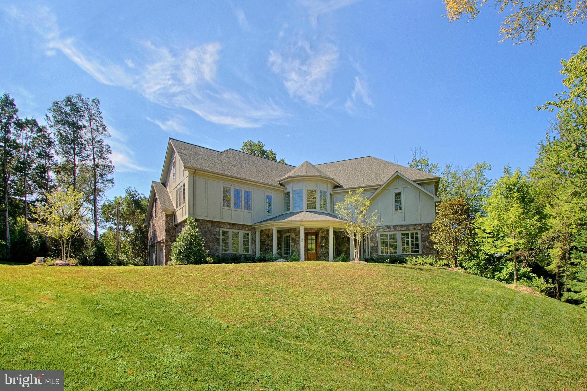 Superior design distinguishes this 4 level 14,000 sq ft  English Tudor from its competition. Expansive yet welcoming main lvl is sensationally spacious w/ formal/informal living. Lavish owners suite plus 4 en-suite BRS grace the 2nd lvl. 3rd lvl offers BR+FullBA w/ kitchen+great rm.. LL w/rec rm/7th BR/exercise/media/game rms. Possible 6 car gar. Perfect for  multi-generational fam.Elevator ready!