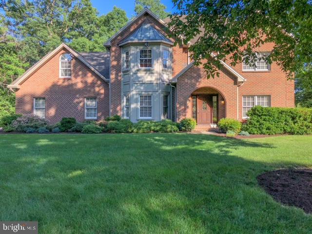 Grand and meticulously maintained home nestled on a corner, 1 acre lot in the Heights of Greenbriar! Stunning setting from the moment you drive into the neighborhood. Enter into the foyer of this beautiful home to see marble floors and over 3000 sq ft of finished living space. Adjacent is the formal living room that can be converted into a den or office featuring pocket doors for privacy. Formal dining room with tray ceiling and pocket doors.  Off the dining room, enter into a custom gourmet kitchen that is a chef’s delight. The amazing kitchen has an abundance of storage and features granite countertops, lighted cabinetry, an appliance garage/coffee station, an eat-in area, and high-end appliances. Appliances include double Wolf ovens, Wolf induction stovetop with pot filler, a dishwasher, a microwave, and a Sub Zero refrigerator. The adjacent family room offers a stunning brick wood-burning fireplace with built-in cabinetry that matches the kitchen. The fireplace features a brick and granite hearth. The second floor offers 5 bedrooms and 3 full bathrooms. The primary suite offers walk-in closets and a private full bath with Calcutta Gold marble countertops. Large composite deck overlooking a tranquil and beautifully landscaped spacious backyard. The partially finished lower level offers rough-in plumbing, tons of storage, and an outside entrance with bilco doors. A newly installed geothermal system, whole house filter, reverse osmosis system, and oversized 3-car garage. Beautifully appointed crown molding throughout. Security System and thermostat that can be controlled remotely. Great private location and yet close to Hershey Medical Center, Hershey area attractions, major highways, and shopping.
