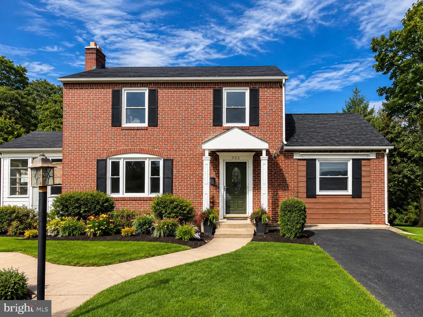 Welcome to this gorgeous single-family home, thoughtfully updated and filled with features today's buyers will love. From the moment you step inside, you'll appreciate the spacious layout, and modern upgrades.

The beautifully updated kitchen is a chef's delight, featuring stainless steel appliances, a cooktop with vent hood, double sink, and ample cabinetry for storage and prep space. The inviting living room offers a cozy fireplace and direct access to the sunroom, creating the perfect space to relax or entertain year-round.

Convenience meets comfort with a main-level primary bedroom and three fully renovated bathrooms, including one on each floor. Upstairs, you'll find additional spacious bedrooms, hardwood flooring, and a beautifully updated bath with a double vanity.

Step outside and enjoy your own private retreat. The fenced backyard features a large deck overlooking scenic mountain views, making it the ideal setting for outdoor dining, entertaining guests, or simply unwinding after a long day.

The finished lower level provides exceptional flexibility with a large recreation room, a full bathroom, and a bonus room with a window that is perfect for a guest room, home office, gym, or hobby space. An oversized storage and workshop area offers plenty of room for tools, equipment, and organization.

Packed with updates, versatile living spaces, and breathtaking views, this home truly offers the perfect blend of comfort, functionality, and charm.