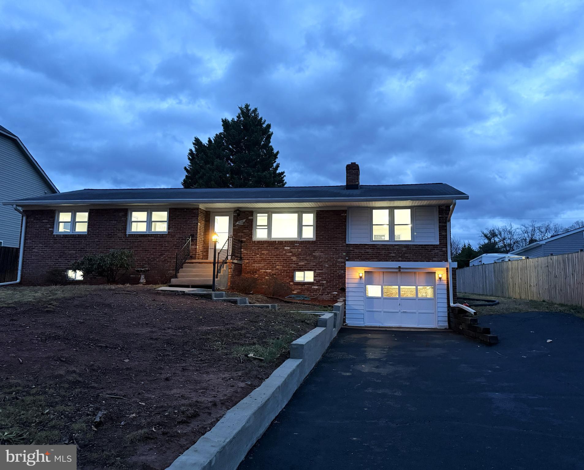 Beautifully renovated raised brick rancher on a quiet 1/3-acre lot! Enjoy a private retreat feel just minutes from premier shopping, dining, and major routes (I-66, Rt-29, Rt-55). The main level features 4 bedrooms and a full bath, all meticulously updated (2026), a cozy fireplace, and a light-filled living room. The gourmet eat-in kitchen boasts brand-new appliances and flows into a spacious sunroom. The fully finished basement offers a massive rec room, full bath, laundry room, and a private bonus room/office. Plumbing & space are already in place for a potential secondary kitchen! Outside, enjoy an expansive backyard with a carport and two large sheds perfect for hobbyists or storage. Move-in ready and waiting for you! some of the photos are virtually staged.
