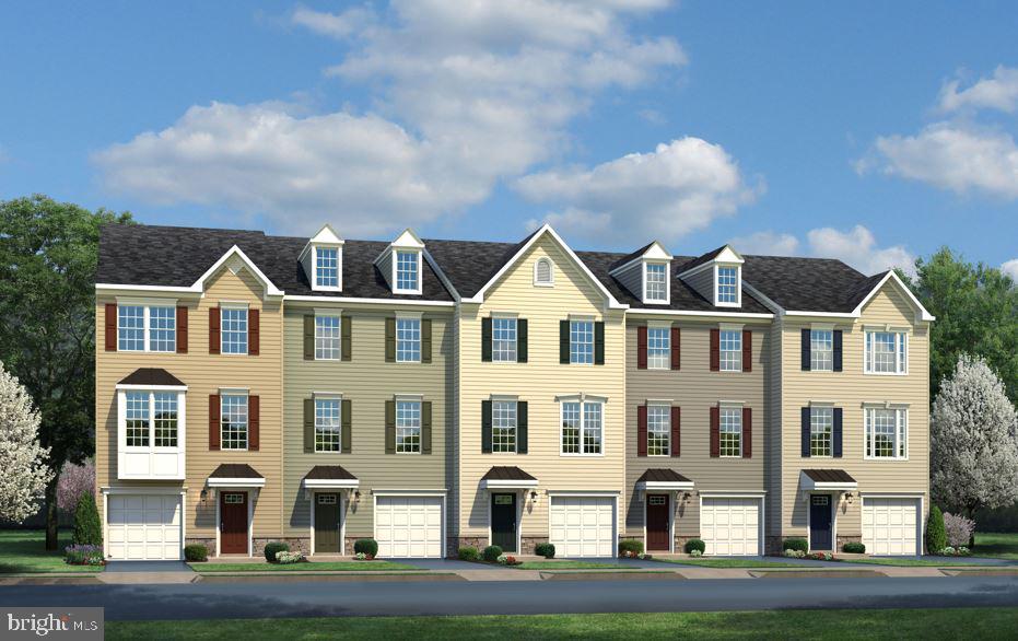 ---TO BE BUILT---MOZART D--- The convenience of townhome living meets the amenities of a single family home in Ryan’s Mozart. The sculptural staircase sets the tone of elegant simplicity and functionality that continues through the rest of the home. On the main living level, an enormous Kitchen with island opens onto a bright and airy Living Room, perfect for entertaining and featuring either a handy coat closet or a conveniently placed powder room. Upstairs are two spacious bedrooms with ample closet space, a hall bath, and a generous Owner’s Bedroom that features a tray ceiling and a huge walk-in closet. For a truly spa-like experience, the separate Owner’s Bath features a dual vanity and 5’ shower with dual shower heads. Feature options for a finished Recreation Room, Study, and Powder Room or Bath. The Mozart offers classic colonial facades. Homesite premiums may apply. Other floorplans and homesites available. Photos are representative.