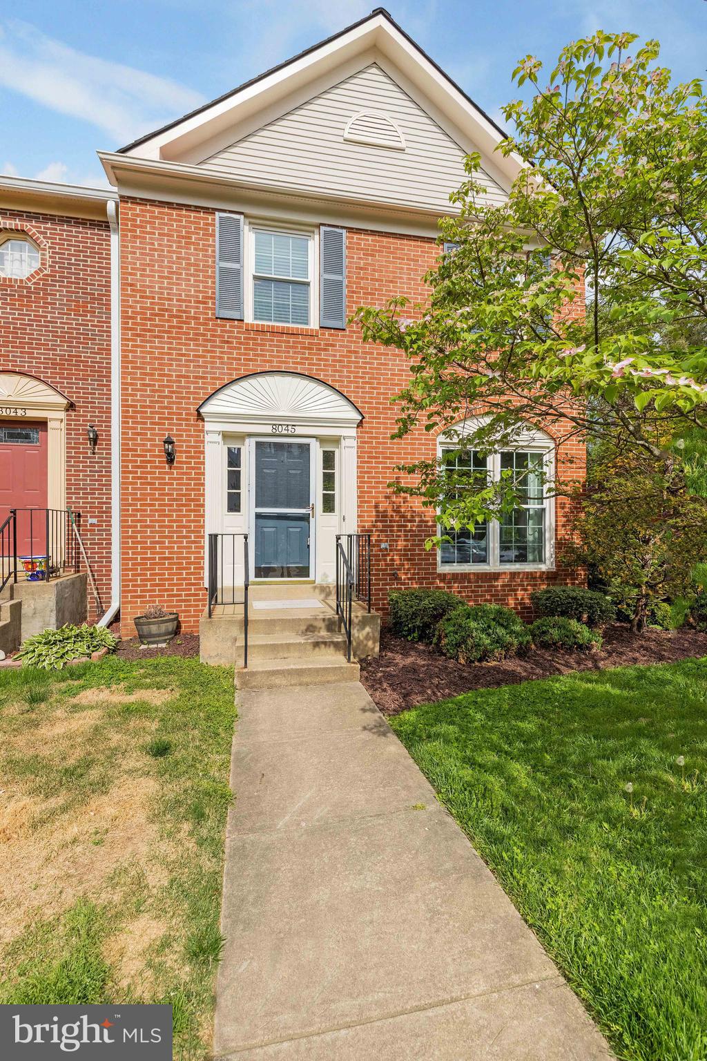 Welcome to 8045 Sky Blue Drive—a stunning brick-front end-unit townhouse located in the highly sought-after Landsdowne community of Alexandria. Beautifully updated and meticulously maintained, this three-level home offers over 2,200 square feet of stylish living space, featuring 3 bedrooms, 3.5 baths, and an ideal layout for both everyday living and entertaining.

From the moment you arrive, you’ll be drawn in by the home’s charming curb appeal. Inside, the open-concept main level is flooded with natural light and features a spacious living and dining area adorned with luxury vinyl plank flooring and an electric fireplace with a wood-burning insert. The beautifully updated eat-in kitchen boasts stainless steel appliances, granite countertops, and a modern backsplash—perfect for cooking and hosting.

A tastefully updated powder room completes the main level.

Upstairs, the owner’s suite is designed with comfort in mind, offering a spacious bedroom, walk-in closet, and a recently renovated ensuite bath. Two additional generously sized bedrooms and an updated hall bath provide plenty of room for family, guests, or a home office.

The fully finished lower level expands your living space with a large recreation room—ideal as a media room, play area, or home gym—plus a renovated full bath, a separate laundry area, and additional storage.

Step outside to your private backyard oasis with a deck that’s perfect for dining al fresco, relaxing, or enjoying the tranquil wooded view. A dedicated storage shed adds even more functionality.

Additional features include one assigned parking space and ample visitor parking, plus numerous recent updates: newer roof, windows, furnace (2021), water heater (2023), and bathroom renovations (2021).

Located within walking distance to Wegmans, dining, and shopping, and just minutes from the Metro and major commuter routes, this home offers the perfect combination of comfort, convenience, and community.

Don't miss this exceptional opportunity—schedule your private showing today and fall in love with everything 8045 Sky Blue Drive has to offer!