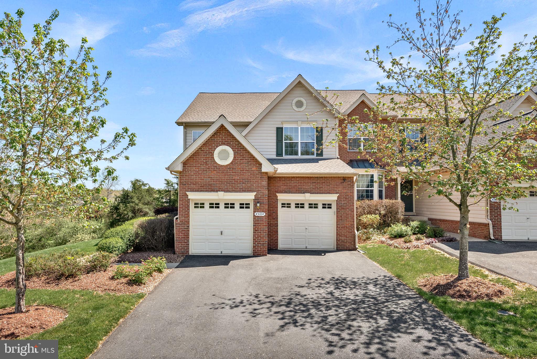 Welcome to this spectacular Lindenhurst model end unit nestled in the prestigious Belmont Country Club, featuring a rarely available walk-out basement! Perfectly situated at the end of a quiet street on a premium lot, this home backs to mature trees and offers stunning views of the golf course, pond, and expansive side-yard common area. Boasting 3,126 square feet of light-filled living space, this home features a two-car garage and an open, flowing floor plan designed for modern living. The upgraded eat-in kitchen impresses with a bright bump-out area, granite countertops, rich cabinetry, an oversized island, custom tile backsplash, under-cabinet lighting, and stainless steel appliances. The luxurious owner’s suite includes a private sitting room/den, a spacious walk-in closet, and a spa-like bathroom you must see to believe. Two additional generous bedrooms share a beautifu​ly appointed hall bath. The fully finished walk-out basement offers a large recreation room, a bonus room perfect for a home office or potential fourth bedroom, a full bathroom, and plenty of storage space. Outdoor living is a dream with an expanded Trex deck and a custom stone paver patio—ideal for relaxing or entertaining. Meticulously maintained by the original owners and loaded with upgrades​, this home offers comfort, style, and peace of mind. Residents enjoy the unparalleled amenities of Belmont Country Club, a premier gated community featuring an Arnold Palmer-designed 18-hole golf course, a 35,000-square-foot clubhouse, swimming pools, tennis courts, fitness center, and more. The HOA fee conveniently covers basic cable, high-speed internet, lawn maintenance, trash and snow removal, security, and professional management. Belmont Country Club is known for its historic Virginia-inspired architecture, family-friendly environment, top-rated Loudoun County schools, and a location close to premier shopping, dining, entertainment, and healthcare facilities. With beautifully landscaped trails for walking and cycling and easy access to commuter routes, Belmont offers a vibrant lifestyle in one of the most sought-after communities in Northern Virginia. Don’t miss this rare opportunity to own a stunning end-unit home with all the upgrades and an unbeatable setting—schedule your private tour today!