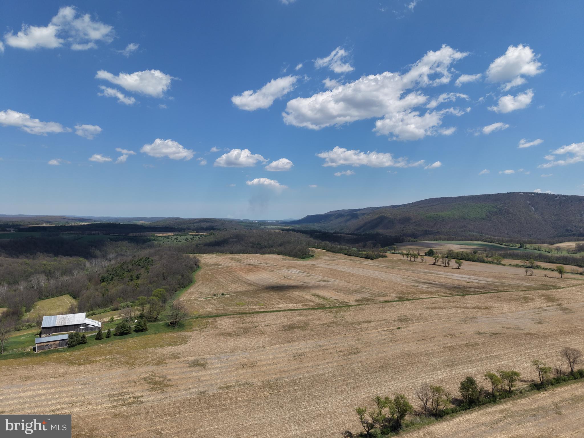 AMAZING 131.24+/- ACRES IN TYRONE, PA! This incredible property features a unique mix of tillable land, wooded acreage w/ mature timber-especially walnut, and useful outbuildings including a large bank barn and equipment shed. Approximately 92 acres are tillable with productive soils, including Hagerstown Silt Loam, and the farmland lays nice and flat, making this an ideal working farm, recreational retreat, or investment opportunity. Outdoor enthusiasts will appreciate the excellent hunting and abundant wildlife, including deer, turkey, and more. Also directly across the road from the Little Juniata River—a renowned wild trout stream and one of Pennsylvania’s most sought-after stretches of trout water. The river showcases excellent diversity, from lively riffles to deep holes, creating ideal habitat for quality Brown and Rainbow trout and making it a premier destination for anglers. Held within the same family for generations, this property presents a rare opportunity to own a legacy farm in a highly desirable location. Conveniently situated near Route 453, Route 22, and I-99, and just minutes from Huntingdon, Alexandria, and surrounding areas, also just 22 miles to State College! The property is also located approximately 17 miles from the Snyders Run boat launch at Raystown Lake! Access to the property is provided through a 50-foot right-of-way off Union Furnace Rd, and the property also offers approximately 70 feet of frontage along Union Furnace Rd. Don’t miss the opportunity to make this extraordinary property your own! 

This property will be offered at auction on Friday, June 12, 2026, at 1:00 PM. The list price in no way represents a minimum, starting, or acceptable bid. 

This property will be offered in a multi-parcel auction, giving buyers the flexibility to purchase Tract 1, Tract 2, Tract 3, Tract 4, any combination of tracts, or the entire property as a whole. Tract 1: 131.24± acres mostly tillable, wooded land, and outbuildings Tract 2: 43.15± acres of wooded land Tract 3: 144.28± acres with a 2 story home and 8,000 feet of river frontage, and  4: 39.99± acres with approx. 11 acres tillable and the balance wooded.

Taxes for the entire property are $8,533; taxes may be reassessed dependent on how the property is sold.