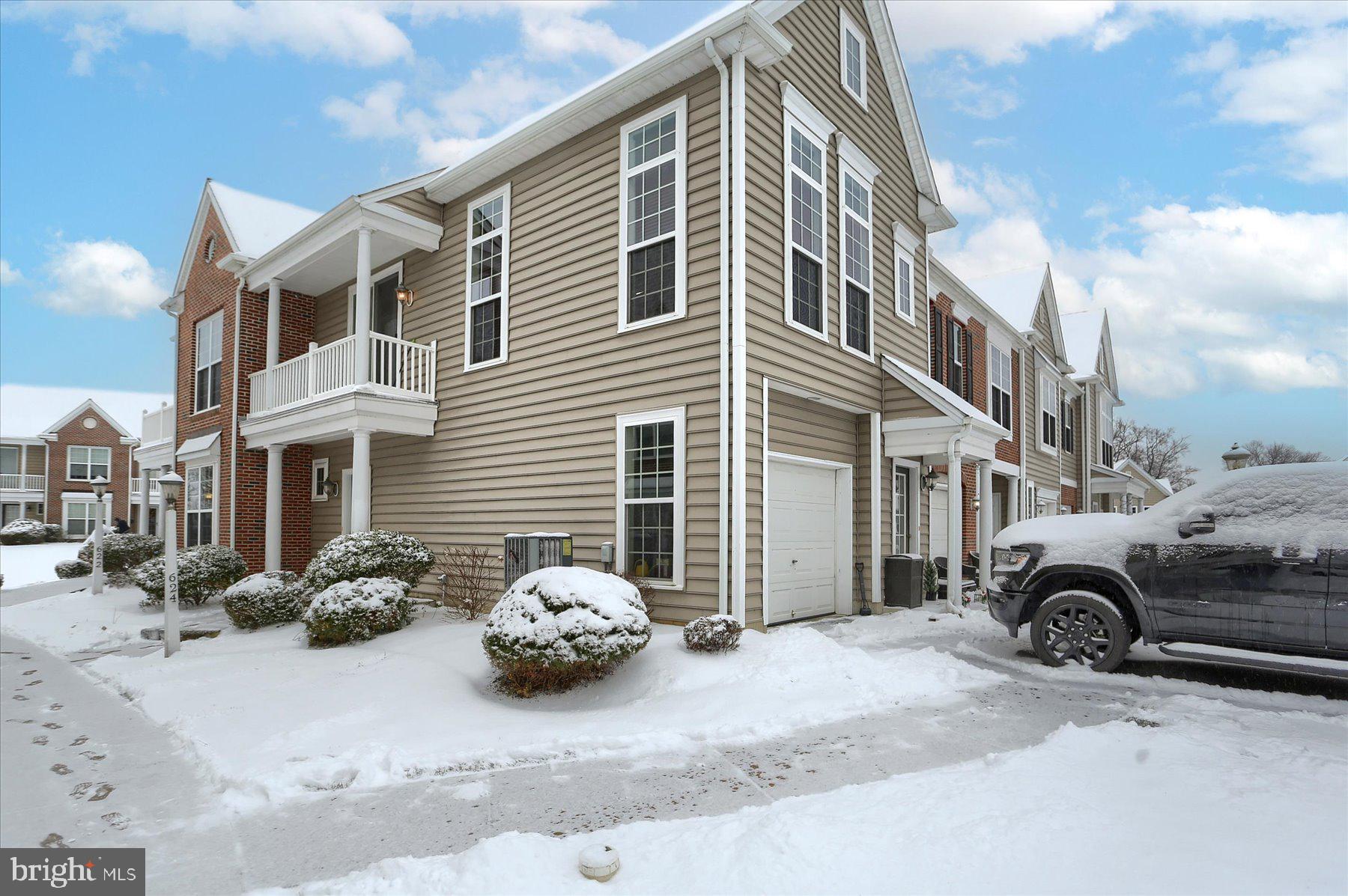 Well maintained end unit townhouse in Deer Run Commons, Derry Township, close to Hershey Medical Center. Spacious entryway to greet your guests. Storage area connected to the garage. Large living room with four floor-to-ceiling windows that flood the room with natural light and allow you to enjoy gorgeous sunrises.  Window treatments included. Open floor plan for entertaining with balcony access from the living room. Hardwood flooring throughout the home. Updated kitchen with stainless steel appliances, granite countertops, and wood flooring. The owners' suite includes two closets and an on-suite bathroom.  Second bedroom or office space. HOA includes lawn care, snow removal and some exterior building maintenance. Washer and dryer included. Ample visitor parking is available.