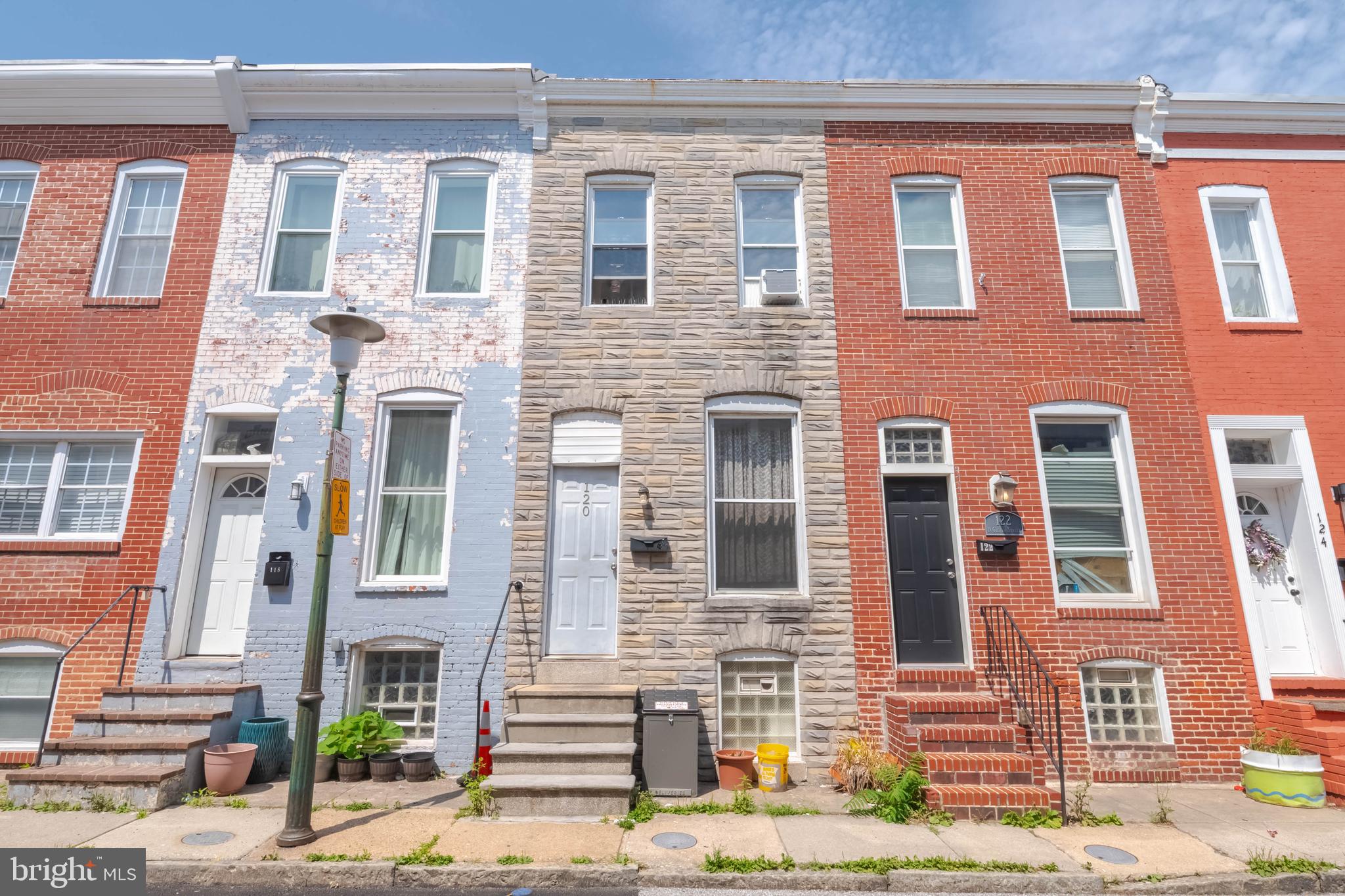 Welcome to 120 N. Glover Street in the desirable Patterson Place neighborhood. This income-producing rowhouse offers 2 bedrooms and 1 full bath and is currently occupied by a long-term tenant who wishes to remain. Monthly rent collected is $930 (partially subsidized), making this an attractive addition to an investment portfolio. The main level features a living room, dining area and kitchen finished with recessed lighting. Upstairs are two comfortable bedrooms and a full bath. The lower level provides abundant storage and in-unit laundry facilities. Situated in a prime city location, this property is minutes from Johns Hopkins Hospital and the popular green space of Patterson Park. Canton, Fells Point, Little Italy, Harbor East and Downtown are all nearby, offering a wide variety of shopping, dining and entertainment. Commuters will appreciate quick access to I-695 and I-95 for convenient travel to Washington, D.C., Philadelphia, New York and beyond.