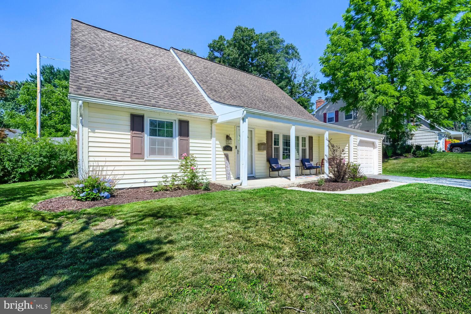 This charming Cape Cod home, built in 1966, offers a perfect blend of comfort and style. With about 2,000 sq. ft. of thoughtfully designed space, it features four inviting bedrooms and two full bathrooms. The open floor plan seamlessly connects the family room to the eat-in kitchen, ideal for gatherings. Enjoy the warmth of a brick wood-burning fireplace, perfect for cozy evenings. The kitchen boasts stainless steel appliances, including a built-in microwave and dishwasher.  The main floor laundry adds convenience to your daily routine. Step outside to discover a well-appointed, fenced yard, perfect for outdoor entertaining on the patio. Additional highlights include LVP flooring and ample storage with a shed. The attached garage provides easy access and parking or storage. This home is a true retreat, ready for you to create lasting memories. Don't miss the opportunity to make it yours!