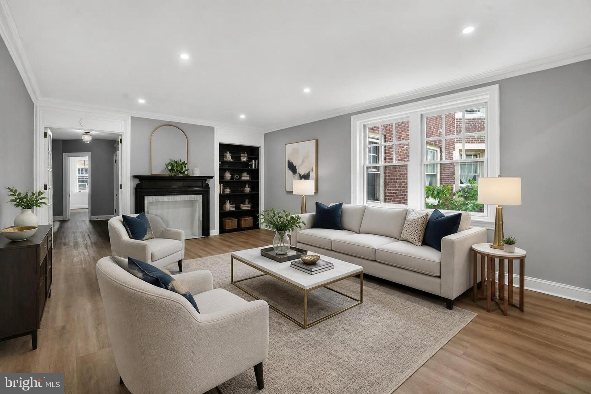 HISTORIC ART DECO CHARM MEETS MODERN HOLLYWOOD GLAM! Step into this meticulously remodeled spacious 1-bedroom, 1-bathroom condo in the prestigious Historic Garden Court Condominium. Built in 1923, the building perfectly preserves its original architectural elegance, welcoming you through secure iron gates into a beautifully landscaped courtyard with serene koi ponds. Security is a premium as the building is secure with an updated fob system that you can download into your phone to grant access to your guests! The entire residence has been thoughtfully updated from the ground up. New kitchen, new bathroom, new electric panel and wiring, all new light fixtures, new plumbing, new flooring, new appliances, several new windows and freshly painted throughout!! As you walk in you are met with sweeping views of the living area that is equipped with new luxury vinyl click waterproof flooring that is throughout the unit, new recessed lights, a custom-tiled faux fireplace and recessed bookshelf that are the focal point of the room.  The gourmet kitchen is outfitted with premium granite countertops, soft-close shaker cabinetry, a dishwasher, garbage disposal, black matte hardware, a custom backsplash and new recessed lights.  The attached spacious dining room has a new chandelier and five custom made, solid wood historically correct and approved double hung bay windows allowing ample natural sunlight to flood in. The oversized hallway is large enough to make it into an office area and has a new chandelier light and ample closet space. The stunning bathroom is completely renovated without losing its historical charm. It has new plumbing and laundry fixtures, a new bathtub with new diverter, new tile surround with a shampoo alcove, new flooring, new toilet, new waste overflow, upgraded solid-wood vanity with granite countertop, new lighting and a recessed stacked washer/dryer. The oversized bedroom features a new fanlight, large closet and renovated historical windows.  THIS IS ALL-INCLUSIVE, WORRY-FREE LIVING: Your monthly condo fee covers heat and hot water, while granting access to a heated indoor swimming pool, a well-equipped fitness center, an elegant party room with a pool table, and a community lending library. UNBEATABLE, COMMUTER-FRIENDLY LOCATION: Ideal for students, medical professionals, or city lovers, this location offers seamless access to both the University of Pennsylvania and Drexel University. Enjoy effortless transit with a brief 3-minute walk to the 42 Bus, connecting you directly to the U-Penn Campus and Hospital Complex in under 20 minutes. 30th Street Station (Amtrak/Regional Rail) is just 25 minutes away by bus, and the Center City shopping district and Rittenhouse Square are a quick commute away. Perfect for anyone seeking a peaceful sanctuary close to everything.