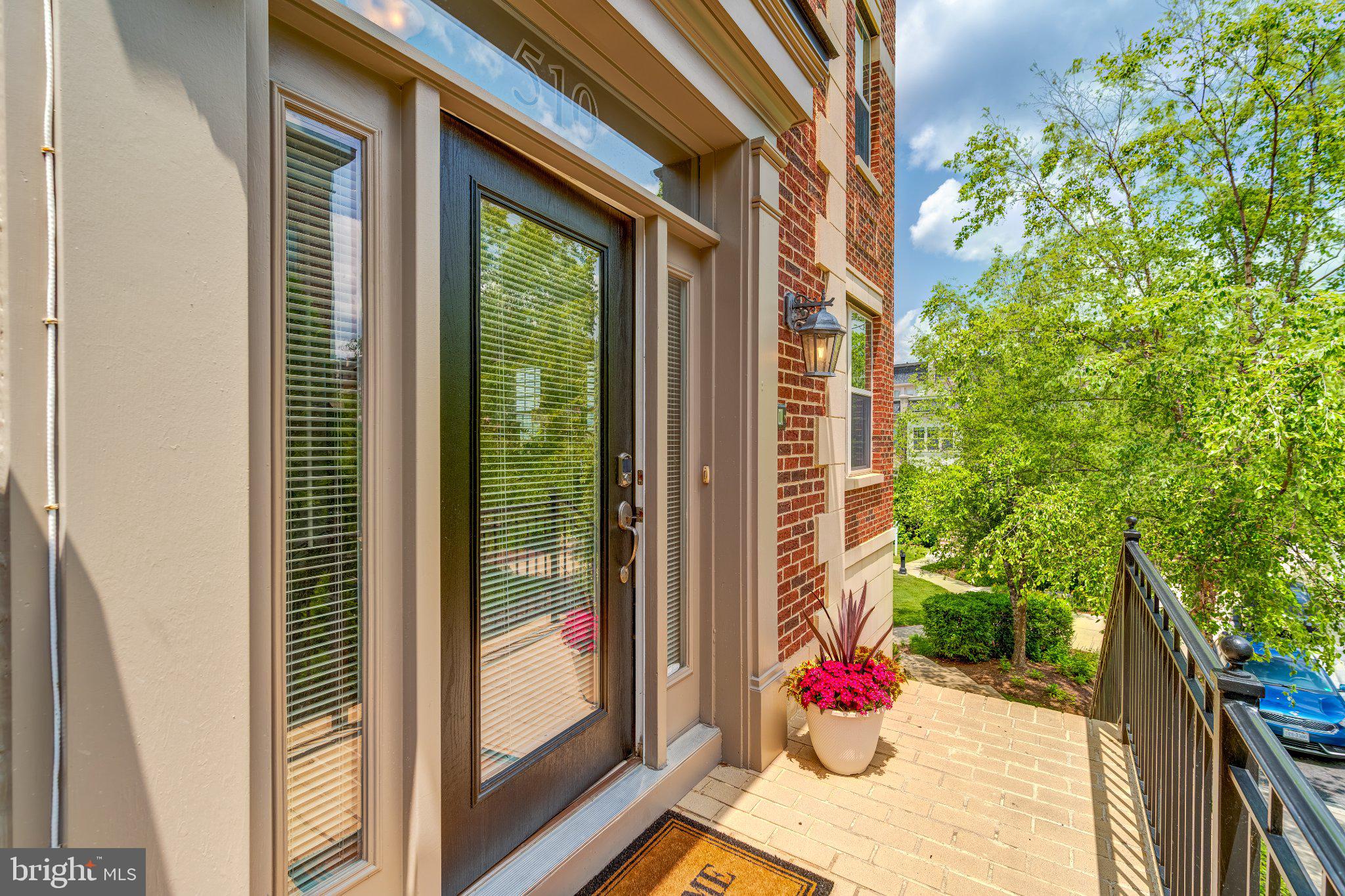 Step into this stunning end-unit brownstone, thoughtfully designed with 4 bedrooms and 4.5 bathrooms, where comfort and elegance meet modern living. Upon arrival, the grand entryway welcomes you with 9-foot columns, leading into a bright and inviting living space centered around a cozy fireplace. Adjacent to this is your gourmet eat-in kitchen, complete with a stylish island, granite countertops, high-end stainless-steel appliances, including double wall-mounted ovens, and new GE side by side fridge.
On the third level, you'll find your serene primary suite featuring an en-suite bathroom with dual vanities, a luxurious soaking tub, and a separate shower. A secondary bedroom is conveniently situated nearby, with the laundry room, equipped with GE front-loading washer and dryer, perfectly positioned between the two spaces.
The top level offers a versatile loft area with a dual-sided fireplace and a wet bar, enhanced with a wine fridge and under-cabinet lighting. This space is ideal for a wide array of uses, whether you envision a library, podcast studio, playroom, fitness area, or a combination of them all. On one side of the loft is the third bedroom, complete with its own en-suite bathroom, while on the other, you'll discover your private rooftop deck. This expansive outdoor retreat boasts breathtaking views of the Potomac River, MGM, and Old Town, making every day feel like a vacation.
This exceptional home is elevated further with premium upgrades throughout, including a whole-home water filtration and softener system, built-in speakers in four areas (loft, rooftop deck, kitchen, and living room), a four-level intercom system, new kitchen tile flooring, and a t hot water heater. The two-car garage is equipped with EV Lectron Home Level 2 charging stations, and the driveway accommodates two additional vehicles.
Situated within walking distance of National Harbor's shops, dining, and entertainment options, as well as courtyards, dog parks, jogging and biking trails, and water taxi access to The Wharf and Old Town, this home offers both convenience and luxury. 

Schedule your showing today!
