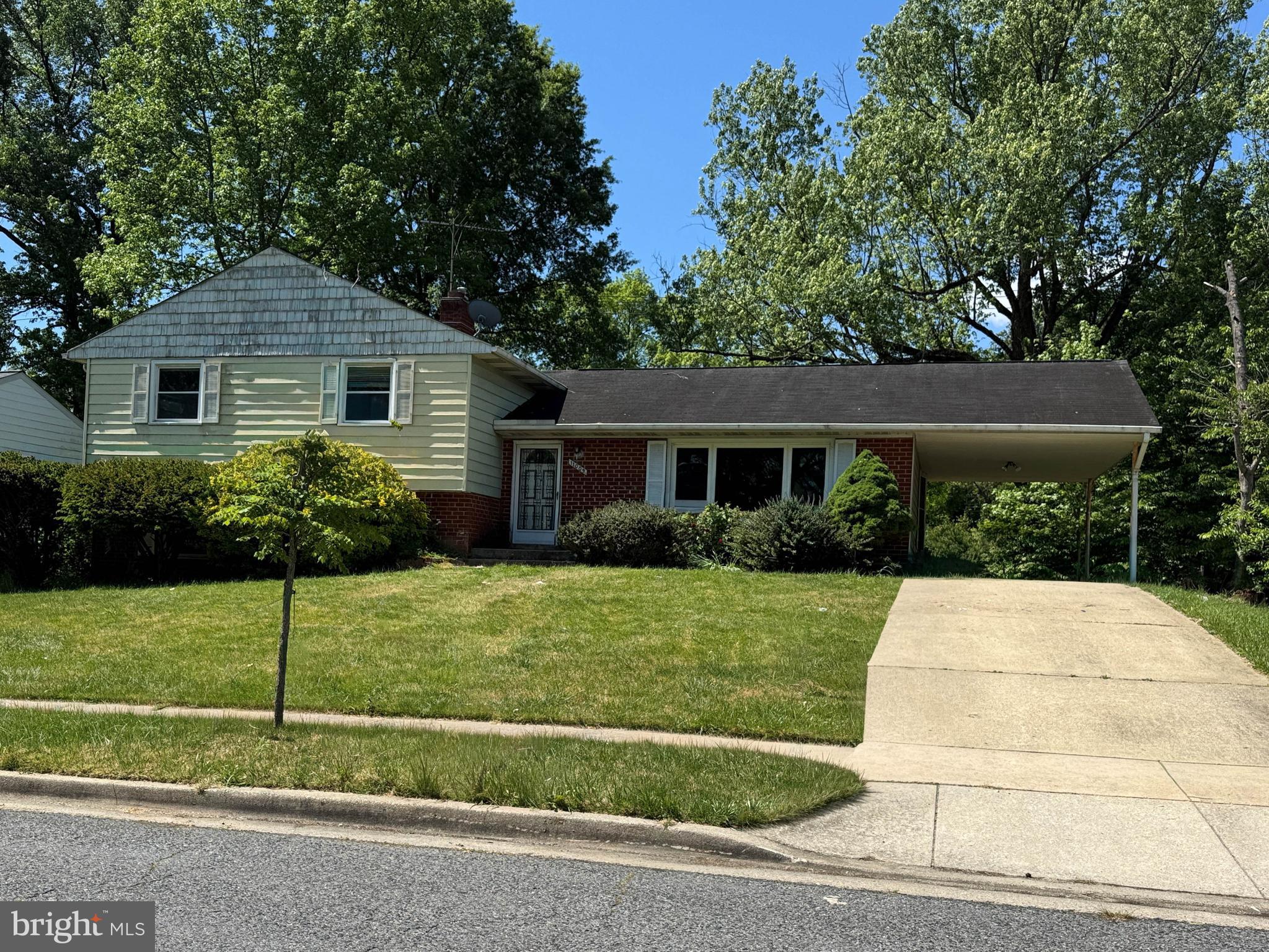 .Welcome to the Kettering neighborhood of Upper Marlboro. The location offers everyday convenience with ashopping center, gym, and retail right across the street from the community. Larger county anchors are also close by, including Bowie Town Center, Wegmans, Lake Arbor, and many of Prince George’s County’s most desirable amenities. 11009 Belton is a 4 level split style home with 2 and one half baths. The finished recreation room offers a woodburning fireplace and level walkout to the flat rear yard. The main level has a table space kitchen with a peninsula countertop. Groceries come in easily through the kitchen door to the carport. There is a sizable living room and separate dining area . 3 bedrooms and two full baths on the upper level plus a 4th bedroom on the rec room level. There is plenty of room to spread out. This one has been well lived in. Bring your ideas and designs. Make it yours.