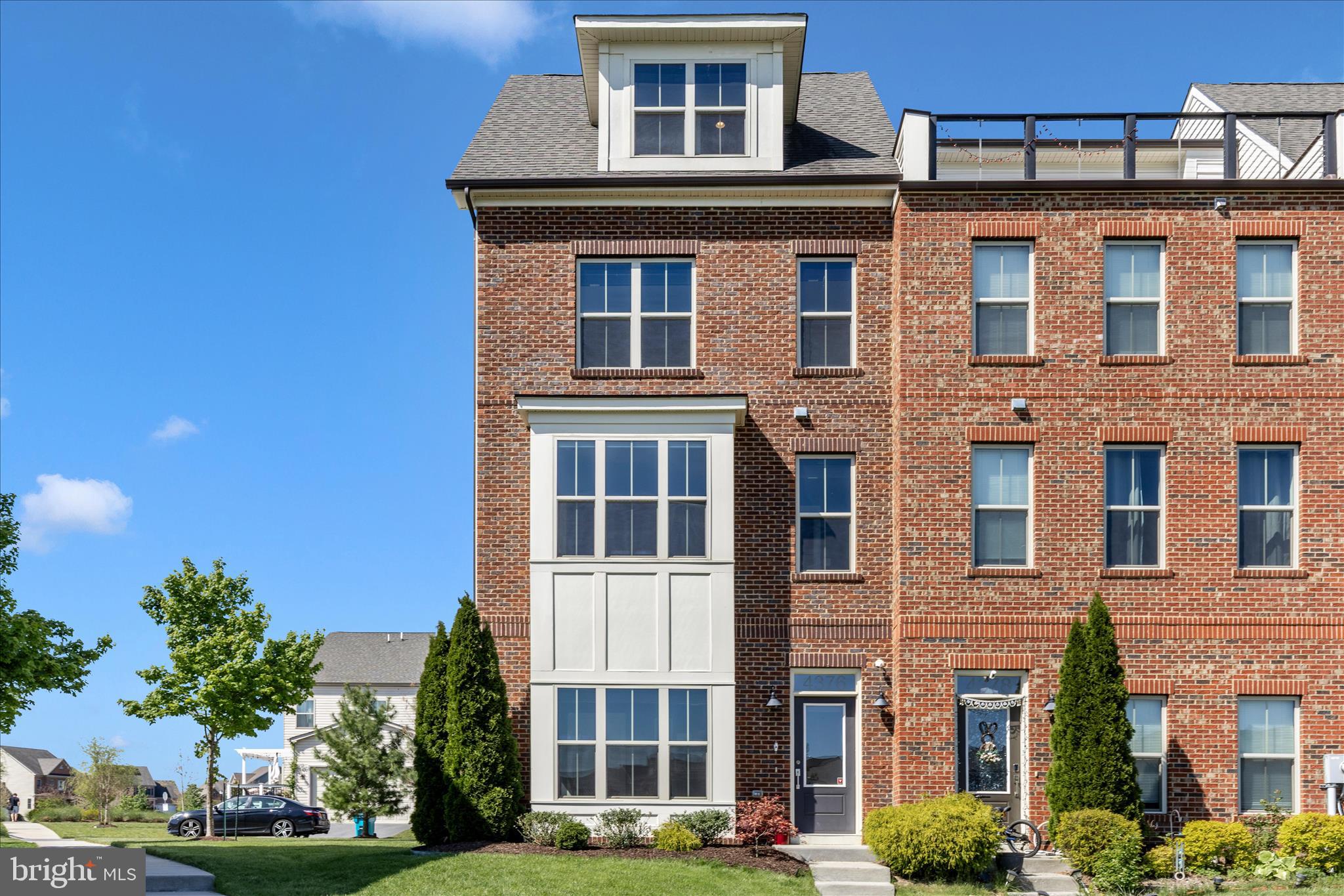 Stunning End-Unit Townhome in Sought-After Landsdale

Welcome to this gorgeous end-unit townhome in the highly desirable Landsdale community, perfectly positioned on one of the best lots with beautiful common-area greenspace and elevated neighborhood views. Offering four finished levels of stylish, functional living, this home blends modern design, natural light, and thoughtful upgrades throughout.

The walk-in level features a spacious study, ideal for a home office, playroom, gym, or flex space, along with access to the 2-car garage and driveway. The main level is bright and open, showcasing gorgeous hardwood floors, endless windows, upgraded lighting, and a contemporary kitchen with quartz countertops and stainless-steel appliances. The spacious family room is both cozy and practical, featuring beautiful custom built-ins surrounding a gas fireplace, plus access to a deck overlooking the community. The other Viridian TH does not have this deck. It was an option and the sellers lovingly upgraded everything.

The third level offers two generously sized bedrooms, a shared full bathroom, and an upper-level washer and dryer for everyday convenience. The top level is dedicated to the private owner’s suite, complete with a custom-tiled en-suite bathroom, dual vanity, and access to a private rooftop terrace. From one of the highest elevations in the community, enjoy breathtaking views of Sugarloaf Mountain and the surrounding neighborhood.

As an end unit, this home is filled with natural sunlight and feels open, airy, and private. Additional highlights include 3 bedrooms, 2 full bathrooms, 2 half bathrooms, custom touches throughout, upgraded finishes, close proximity to guest parking, and four glorious levels of living space.

Landsdale is known for its incredible amenities and vibrant community lifestyle, including weekly food trucks, movie nights, concerts, festivals, clubhouse events, walking trails, pools, playgrounds, and more. The brand-new elementary school adds even more convenience, and the location offers easy access to I-270, I-70, Mount Airy, New Market, Urbana, and Downtown Frederick.

This home is the perfect blend of luxury, functionality, views, and community living — all in one of Frederick County’s most loved neighborhoods. 
Look no further; you are home!