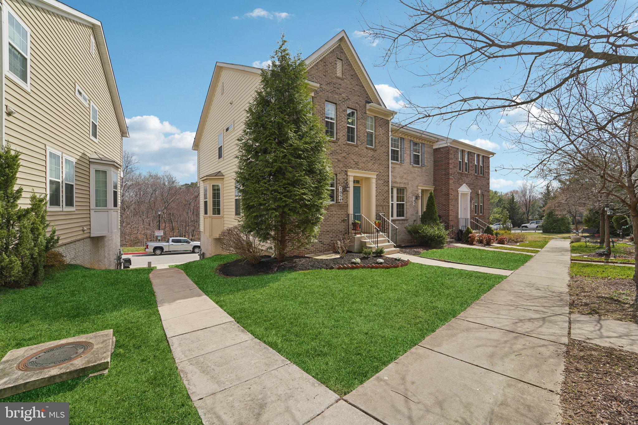 Multiple offers received.  Offer deadline 3/23 @ 5:00PM.  Welcome to Fox Hunt Estates. This end unit brick front townhome offers a premium setting, thoughtful upgrades, and a functional three level layout.

Upon entry, you are welcomed by a light filled open concept main level with hardwood flooring throughout. The spacious living room flows seamlessly into the dining area, creating an ideal layout for both everyday living and entertaining. The gourmet kitchen is positioned just beyond, featuring an oversized island, granite countertops, gas cooktop, and double wall ovens. A rear deck extends the living space and provides the perfect setting for outdoor entertaining.

The upper level offers three generous bedrooms, including a spacious owner’s suite with a private en suite bath and a large walk-in closet complete with custom organizers.

The lower level adds versatility with a fourth bedroom, full bath, and additional storage space, ideal for guests, a home office, or flex living.

The rear load two car garage includes an epoxy finished floor and electric vehicle charger, along with a driveway that accommodates two additional vehicles.

Positioned on one of the best lots in the community, this home is located at the end of the street and backs to open space with a wooded view, offering both privacy and a peaceful setting.

Conveniently located approximately 7 miles from Fort Meade and 30 miles from Washington, DC, this home offers a balance of comfort, location, and accessibility.