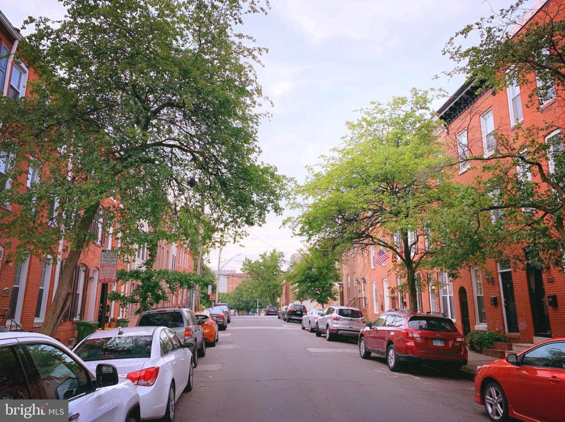 With 3 large even sized Bedrooms, 2 Dens, 2 Full Bathrooms and a ROOF DECK! This home equates to $800 per bedroom. Located one block away from the Cross Street market makes this the perfect home to live in close proximity to all of the action. What and amazing home in an amazing location!
